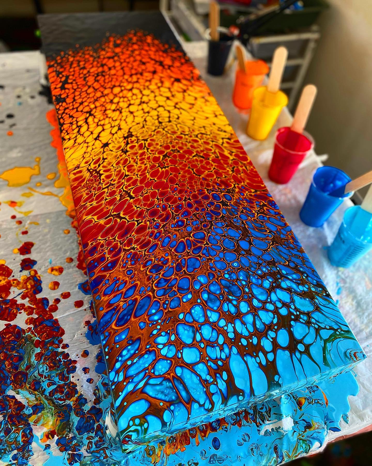 I make abstract art using fluid acrylics. Here’s one of my favorite