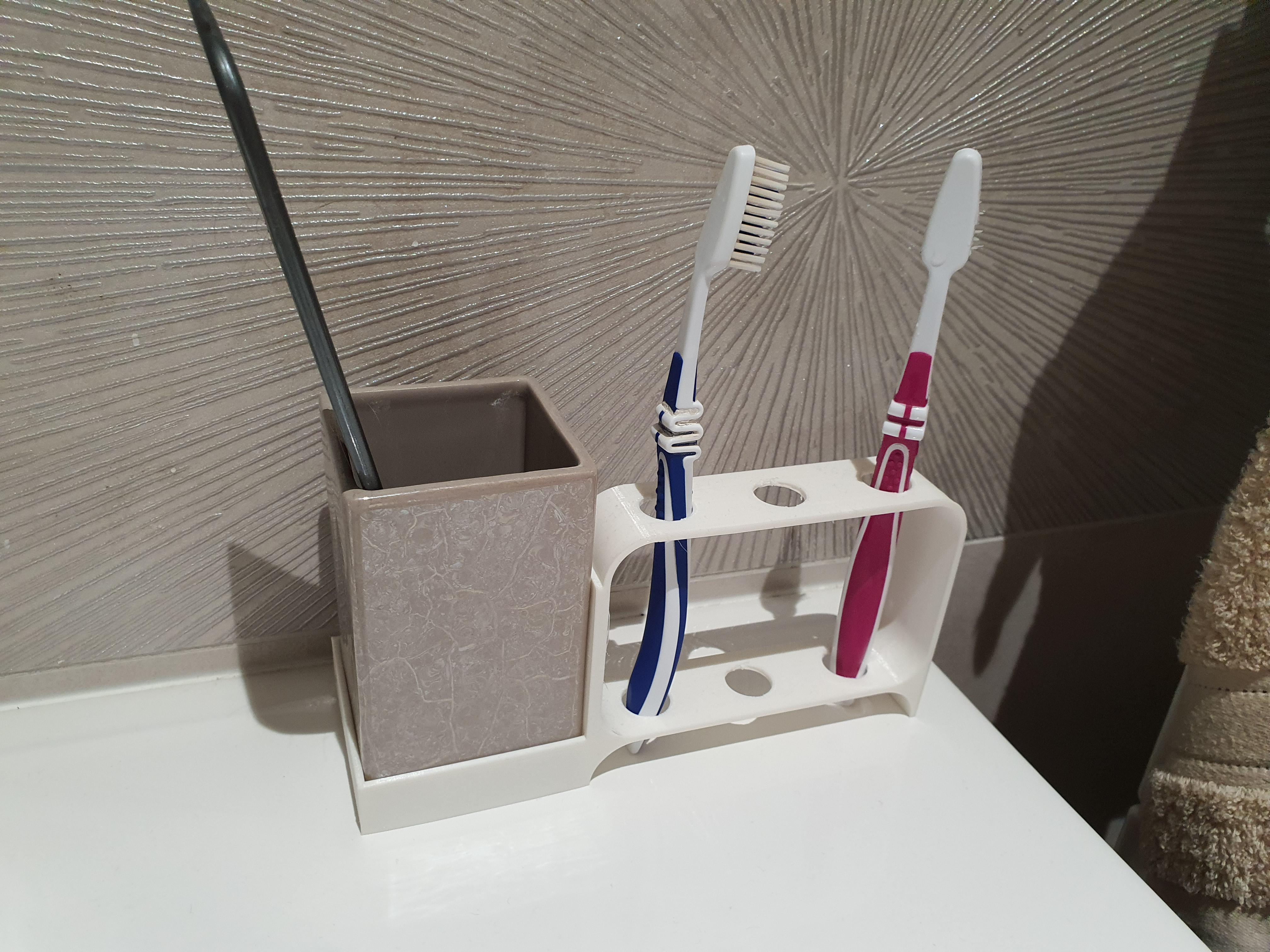 Perfect toothbrush holder fixed around this jar. Far more hygienic