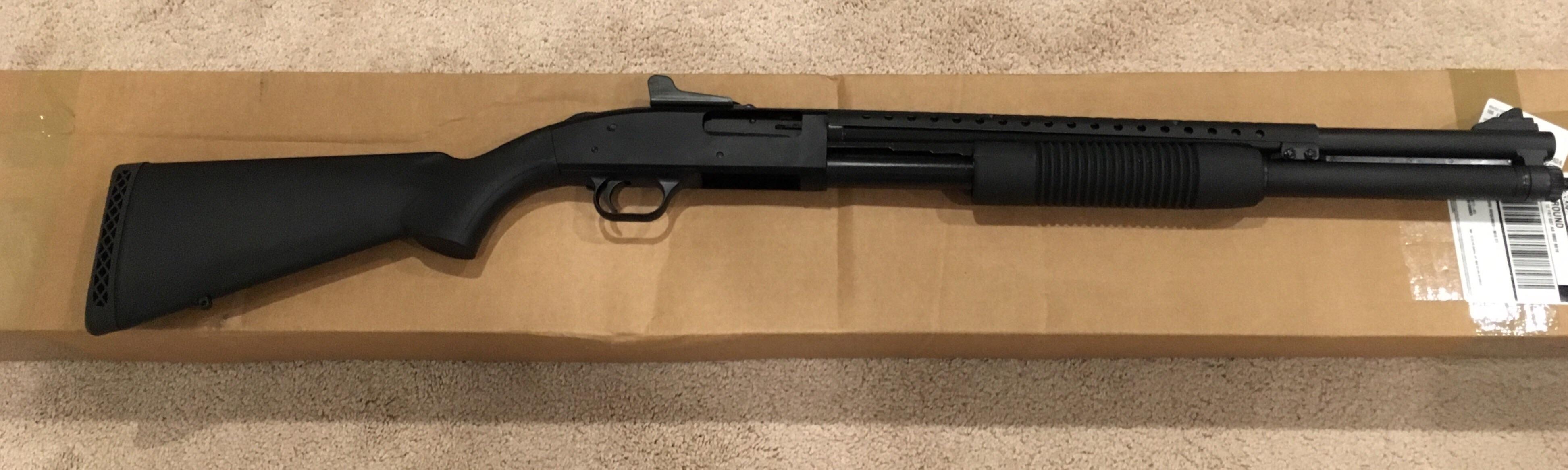 Mossberg 500 Persuader with heat shield and ghost ring sights. My first