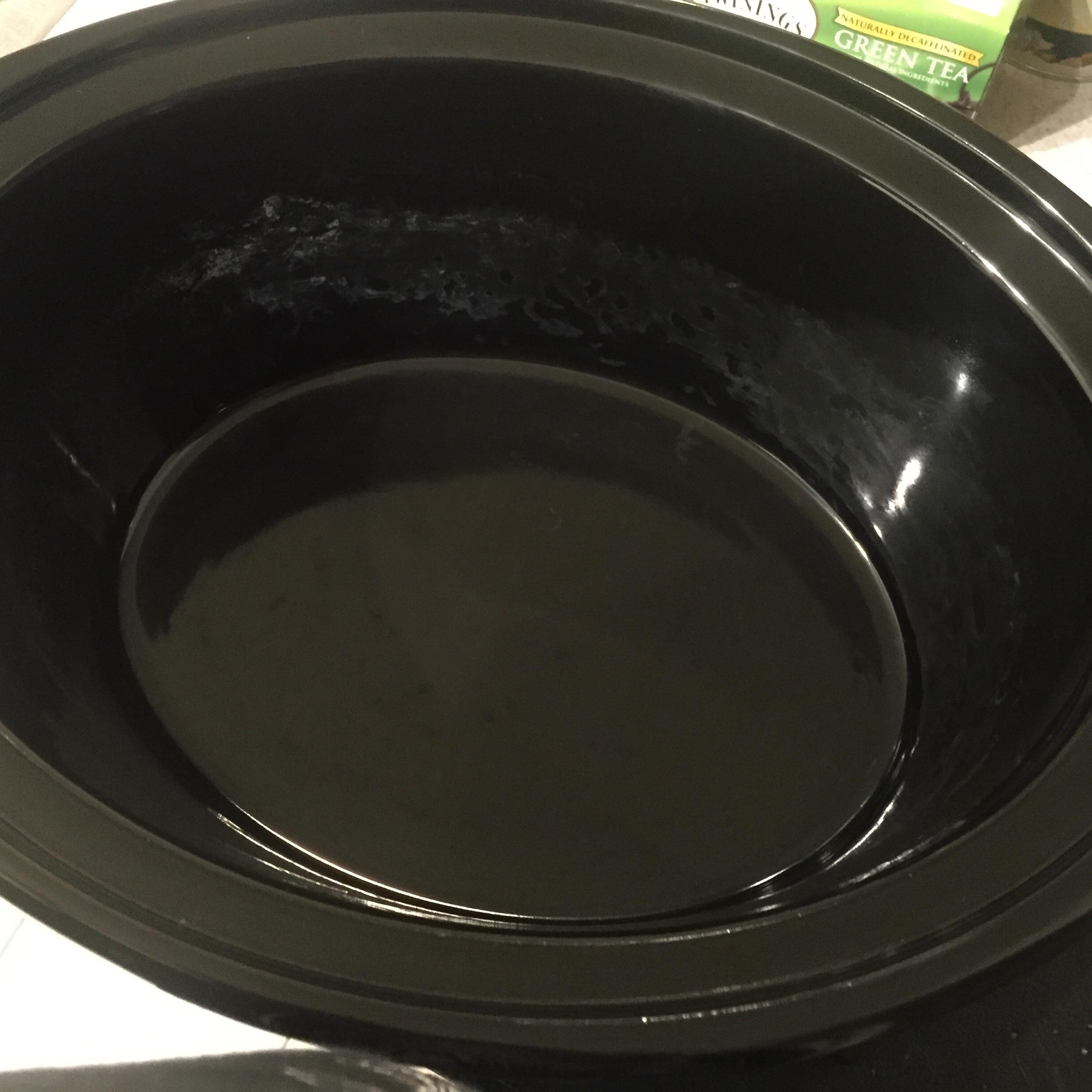 I wash out my crockpot with soap and warm water, when I dry it off this