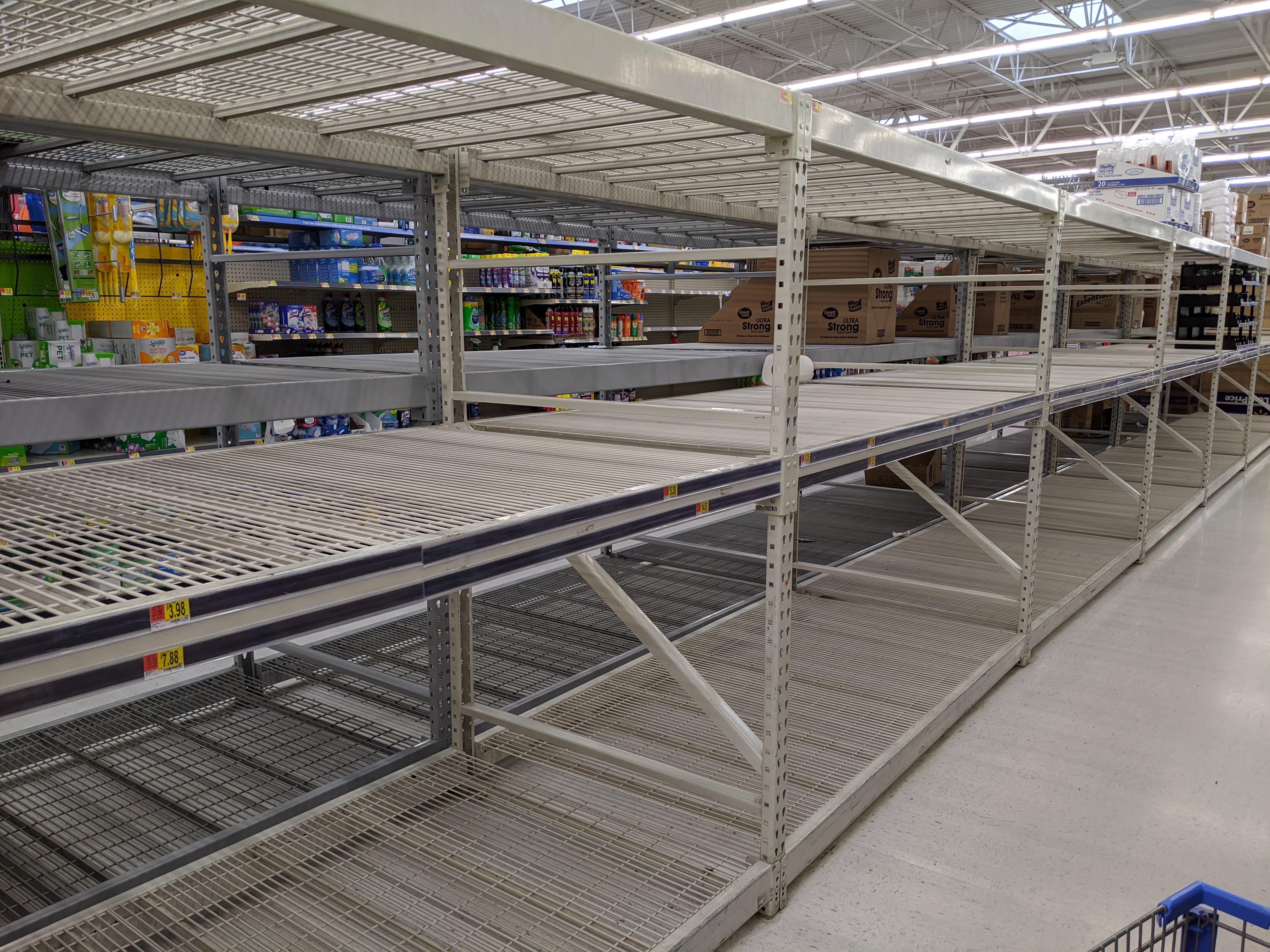 An empty toilet paper aisle at Walmart in Lafayette, TN r/pics