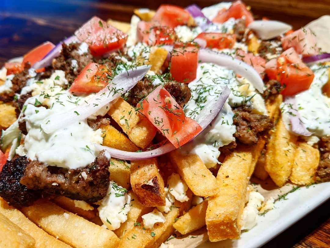 Greek fries loaded with gyro meat, herbed tzatziki, feta, onions and tomatoes. Love me some