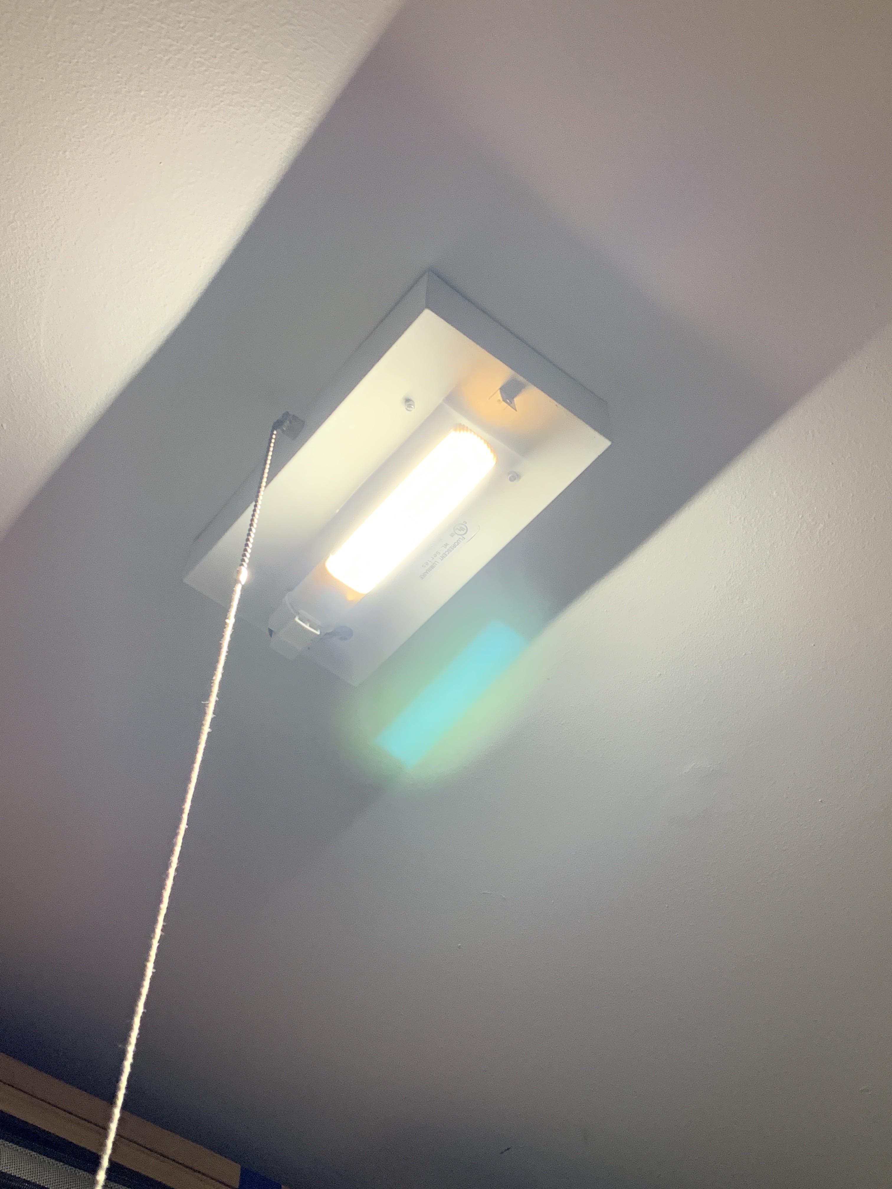 Add an outlet? I have a fluorescent? bulb will a pull string in my