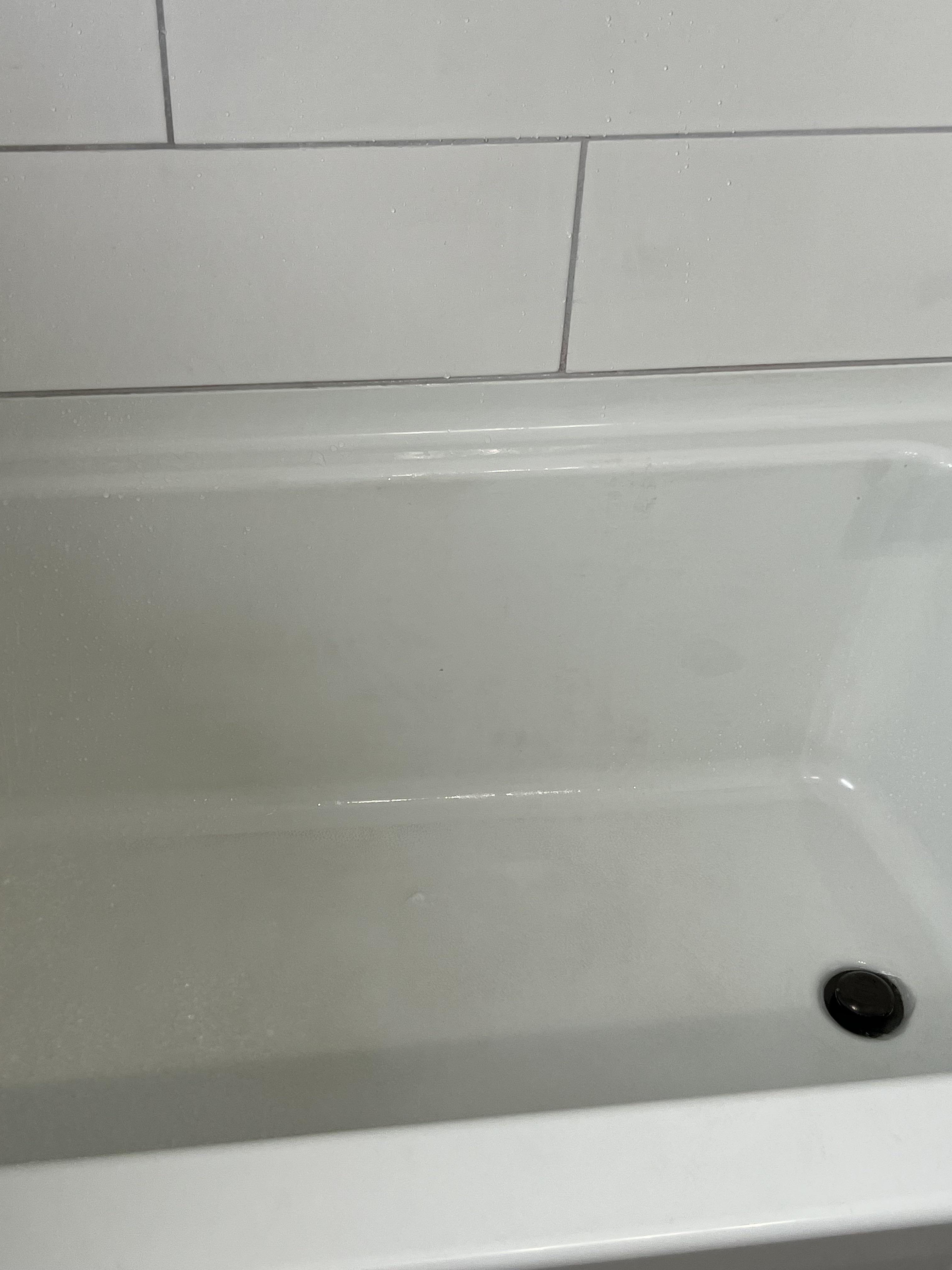 Fiberglass tub. I’ve tried vinegar/BS/dawn. Tried scrubbing it with