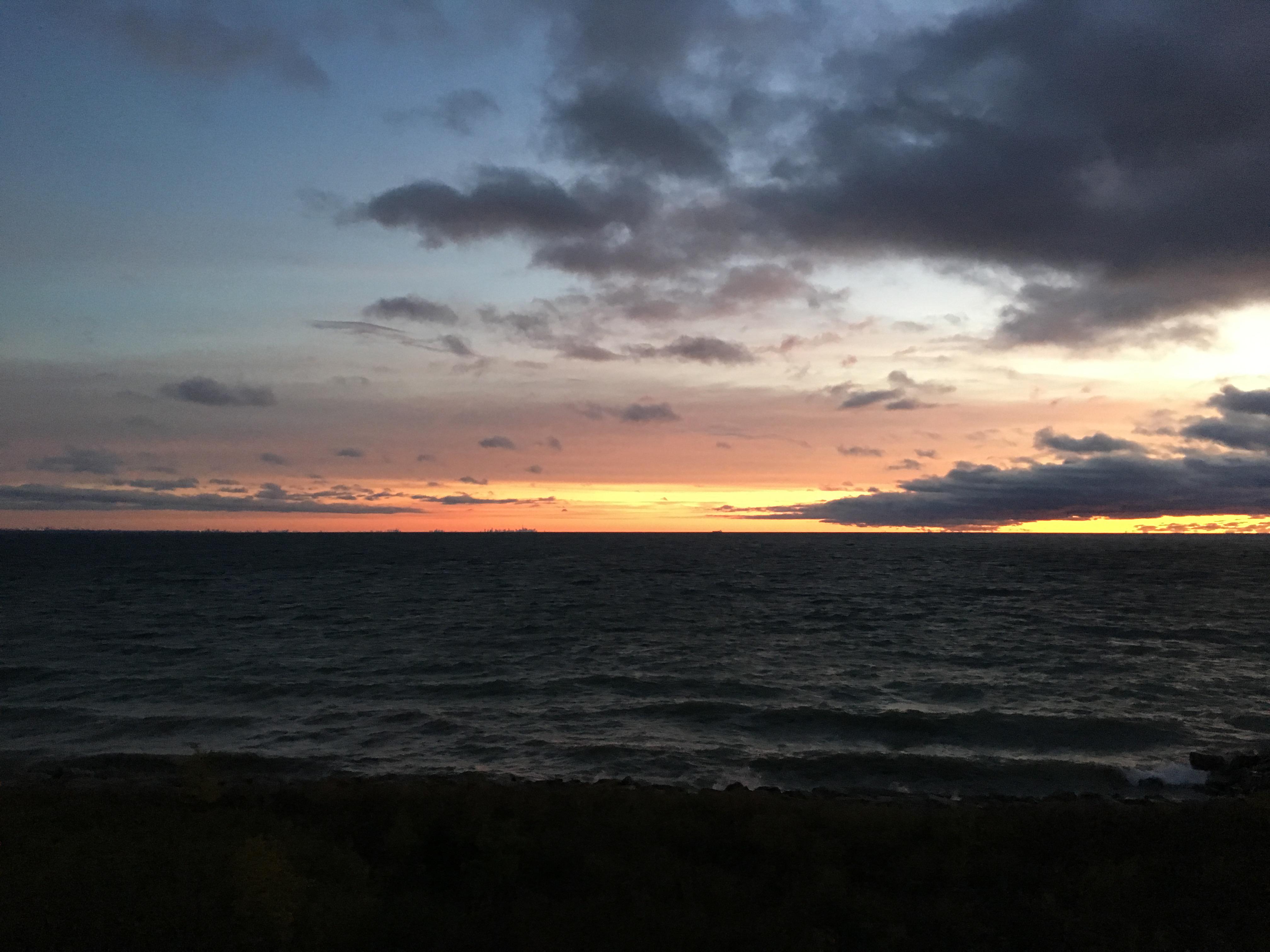Lake Ontario this morning, with sunrise and distant Toronto (from my