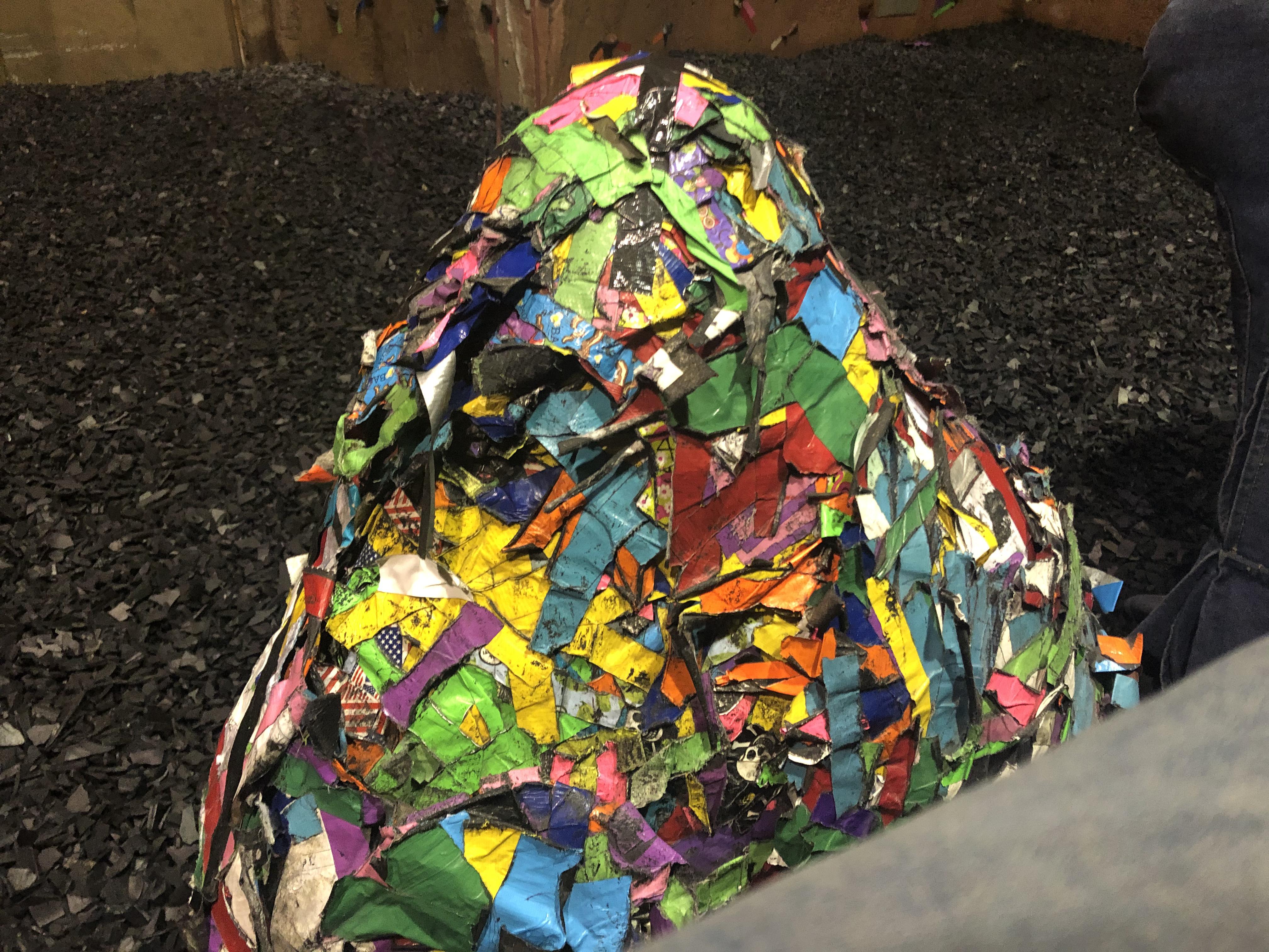 3ft ball of duct tape at a rock climbing place from old routes (22yrs of tape) r/interestingasfuck