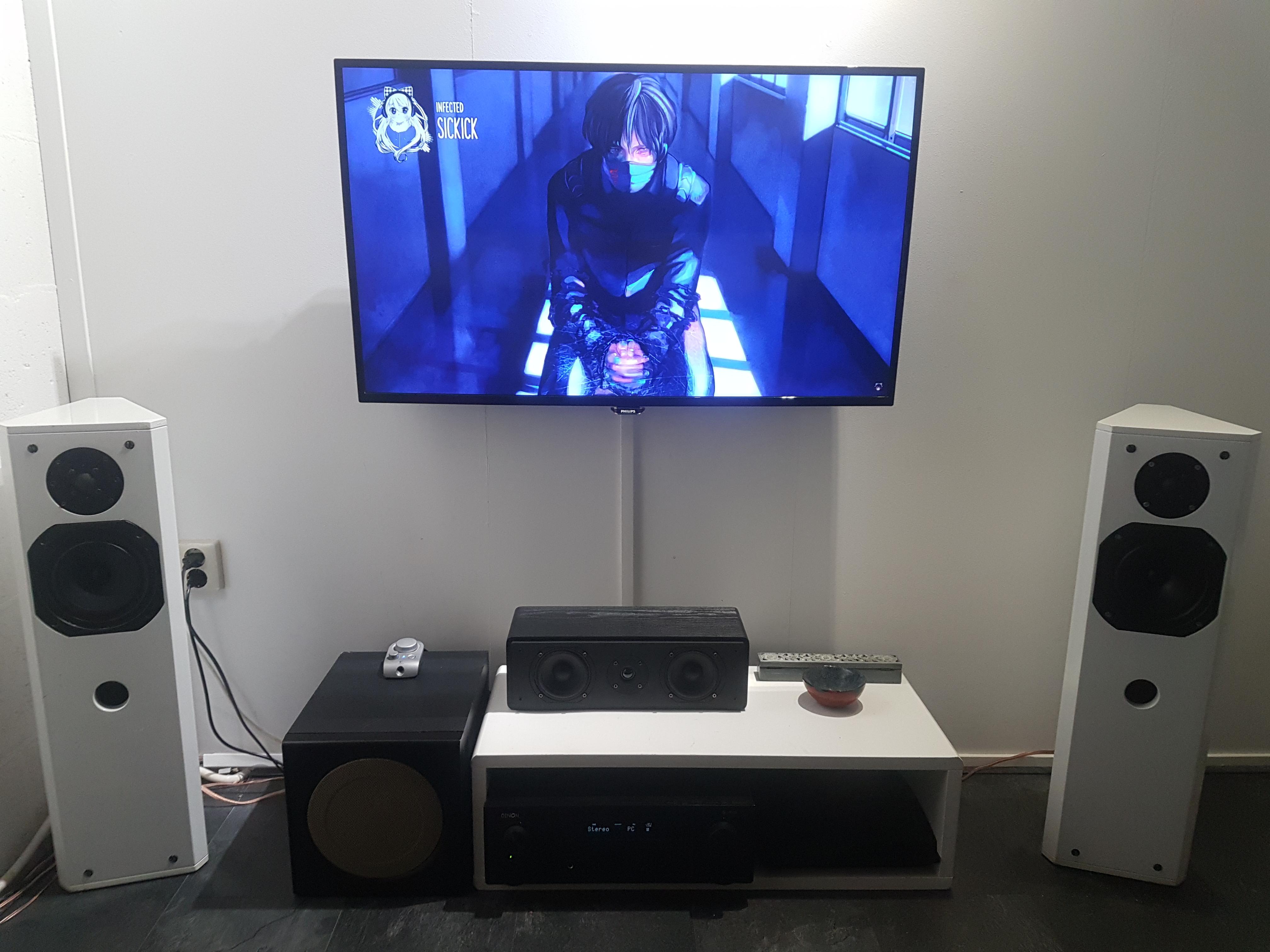 My setup. any tips for getting the center speaker below the TV witouth