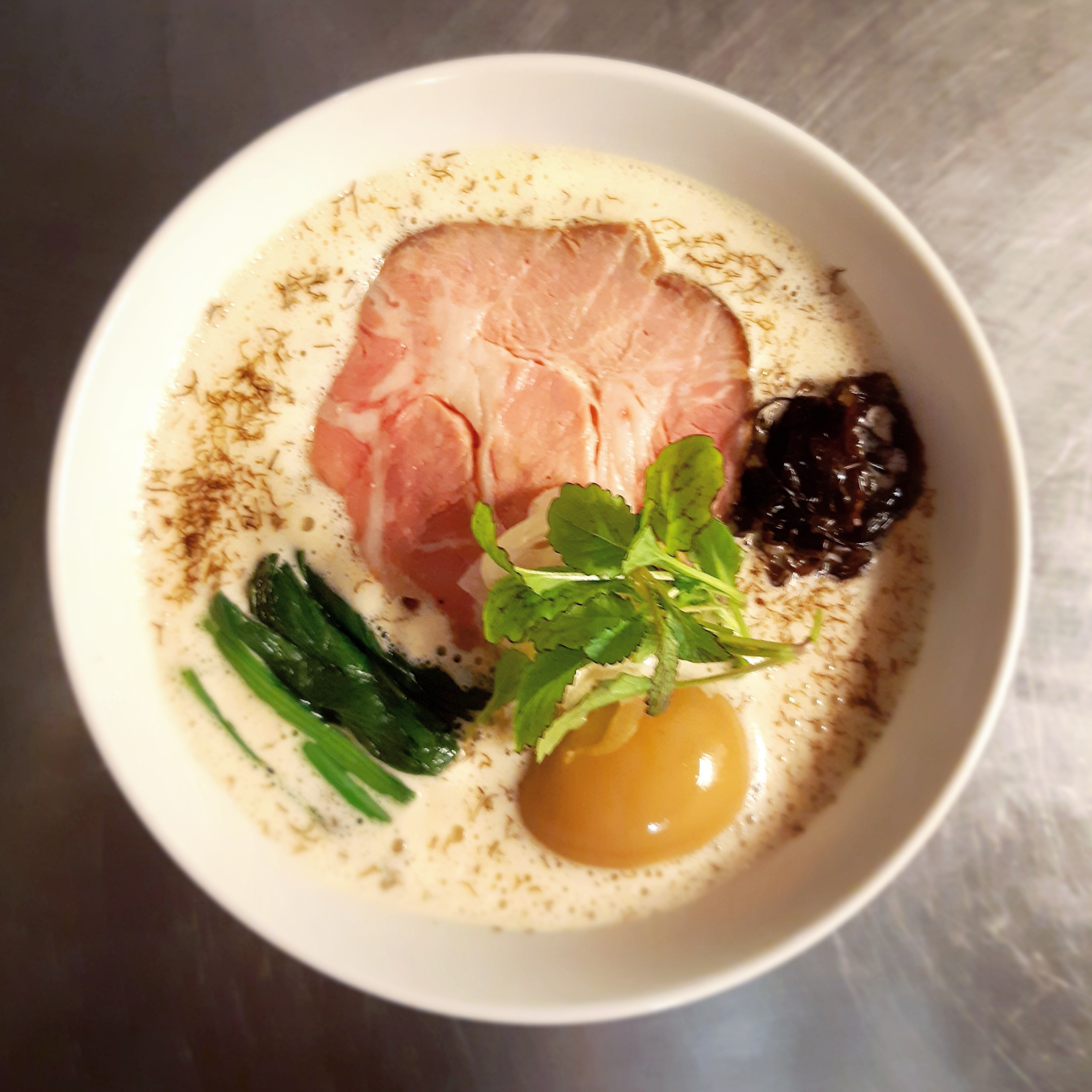 Sea truffle shoyu tonkotsu WATER&BONE Pork shoulder chashu, spinach