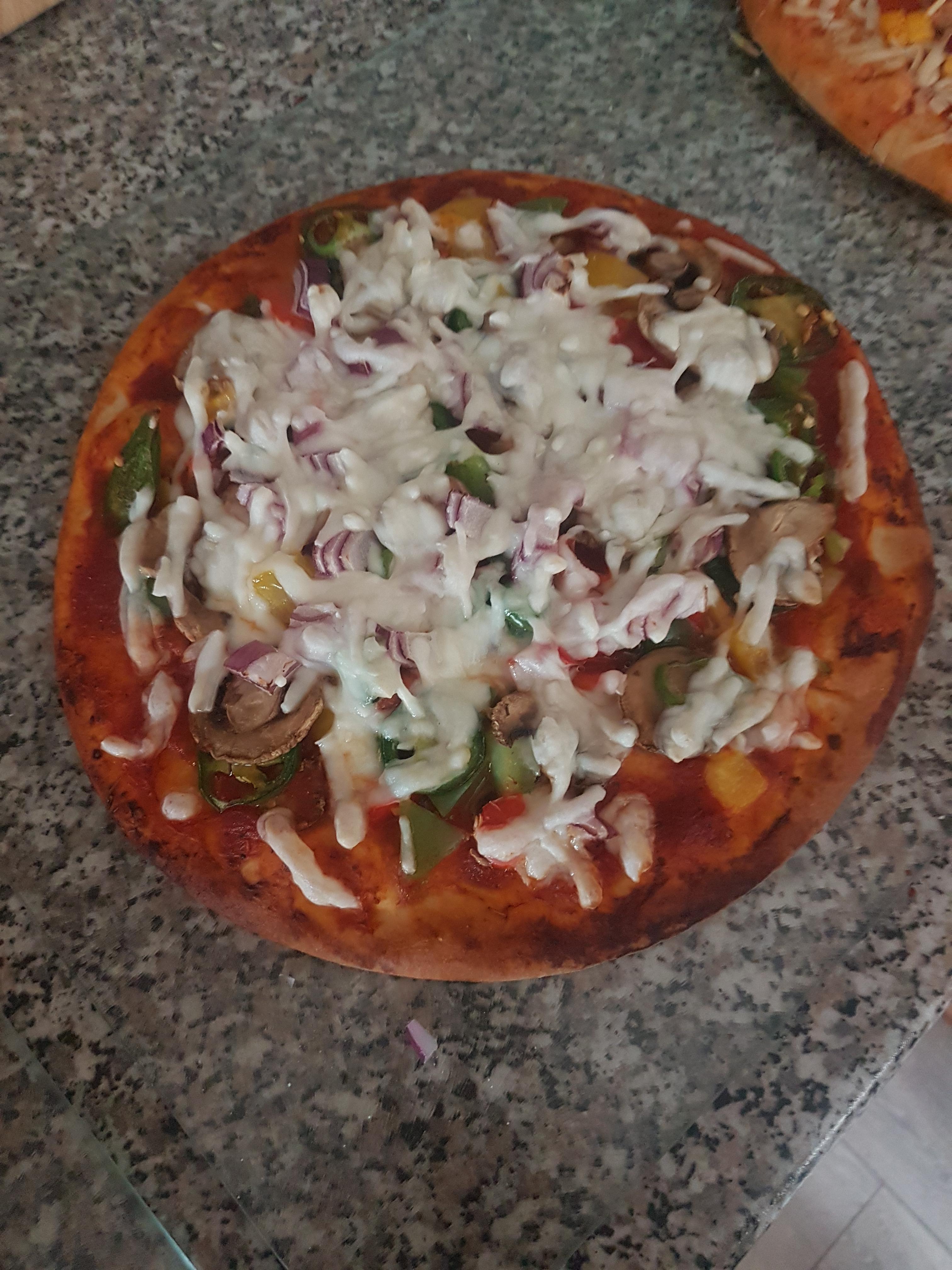 Mother made me a vegan pizza. ASDA vegan cheese is lovely melted and a