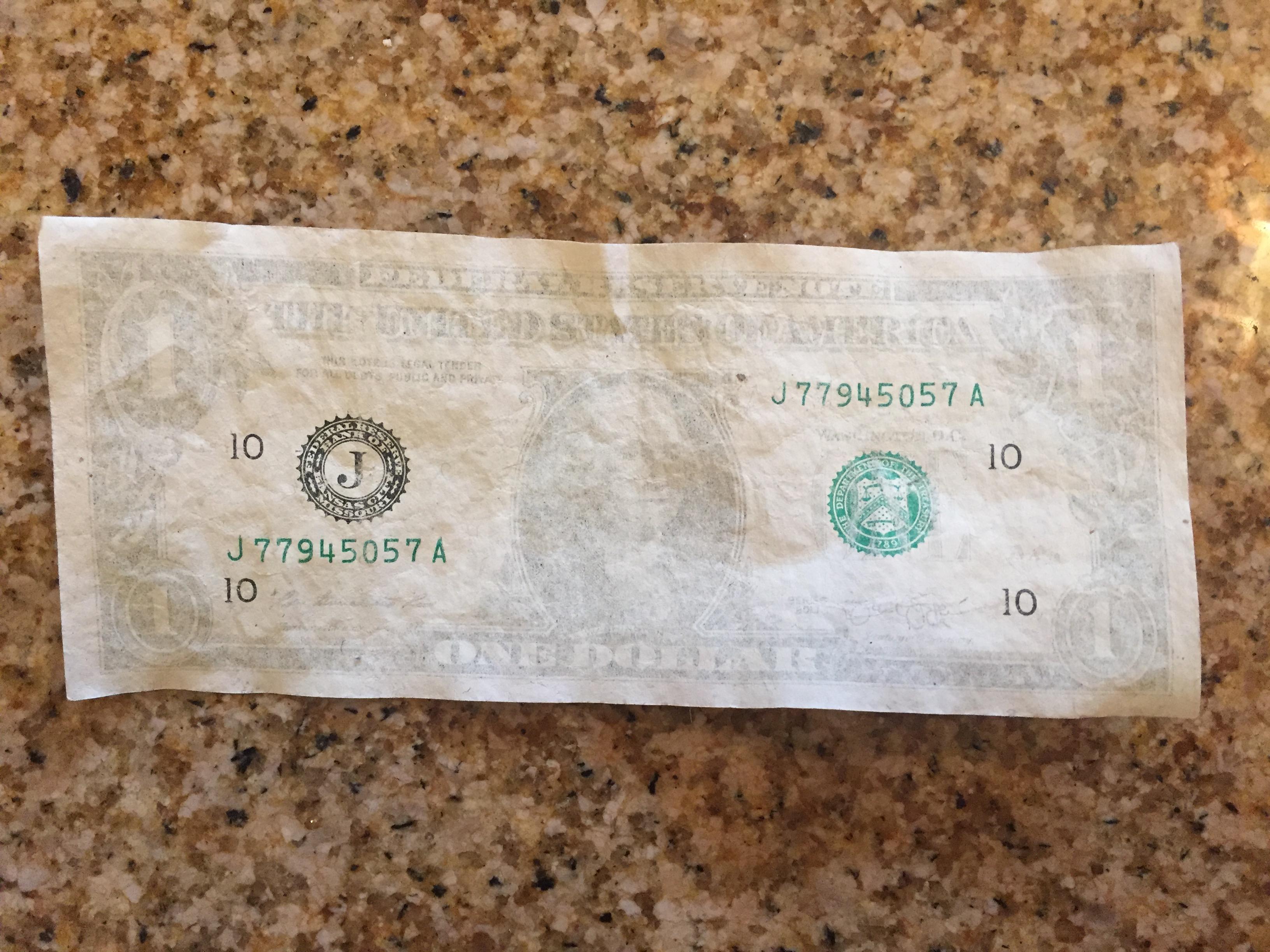 Washed a U.S. 1 bill and all the color bleached out?!? mildlyinteresting
