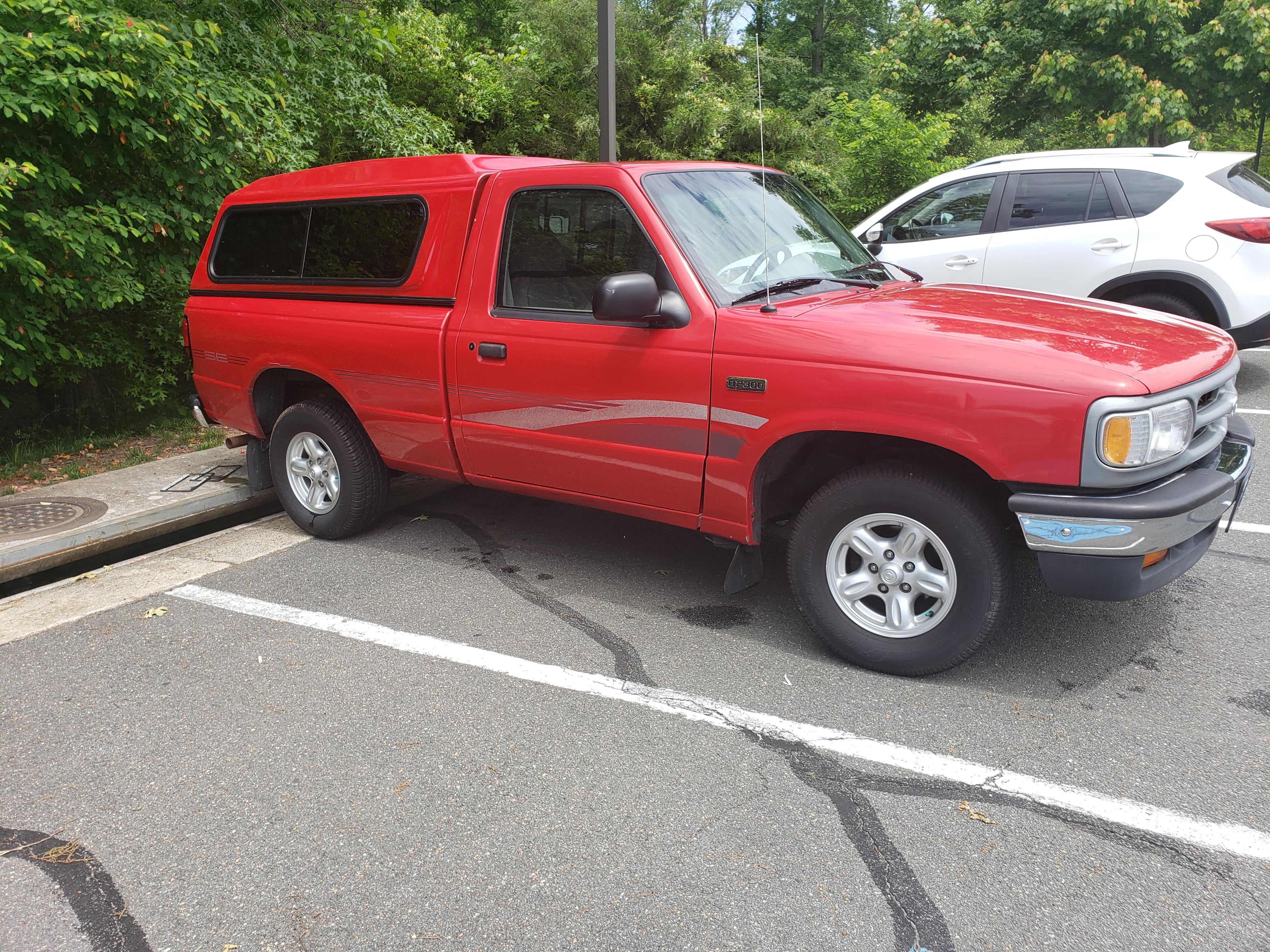 Love seeing clean older Mazdas come thru. r/mazda