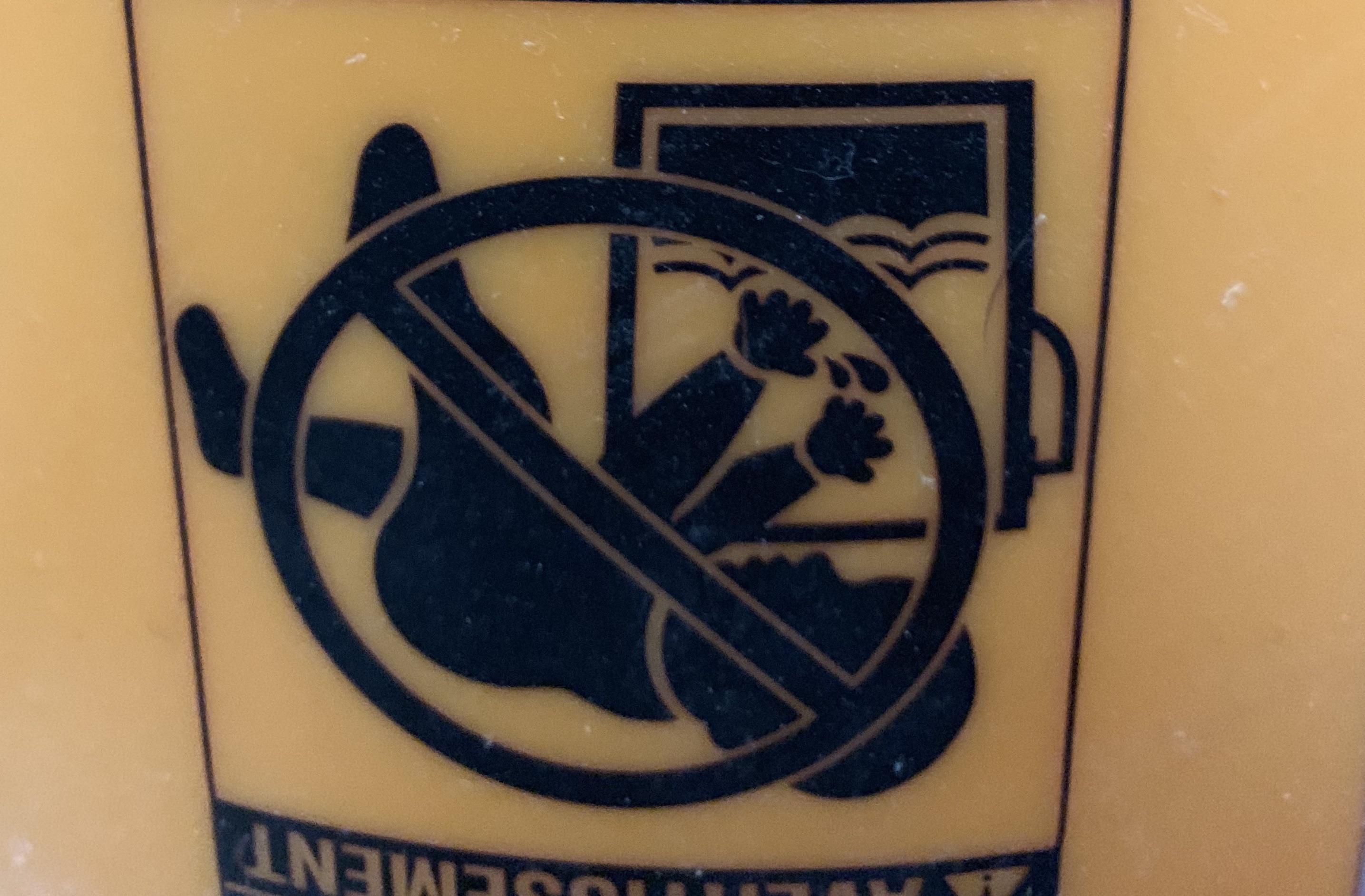 Turning a five gallon bucket upside down warns against babies chugging