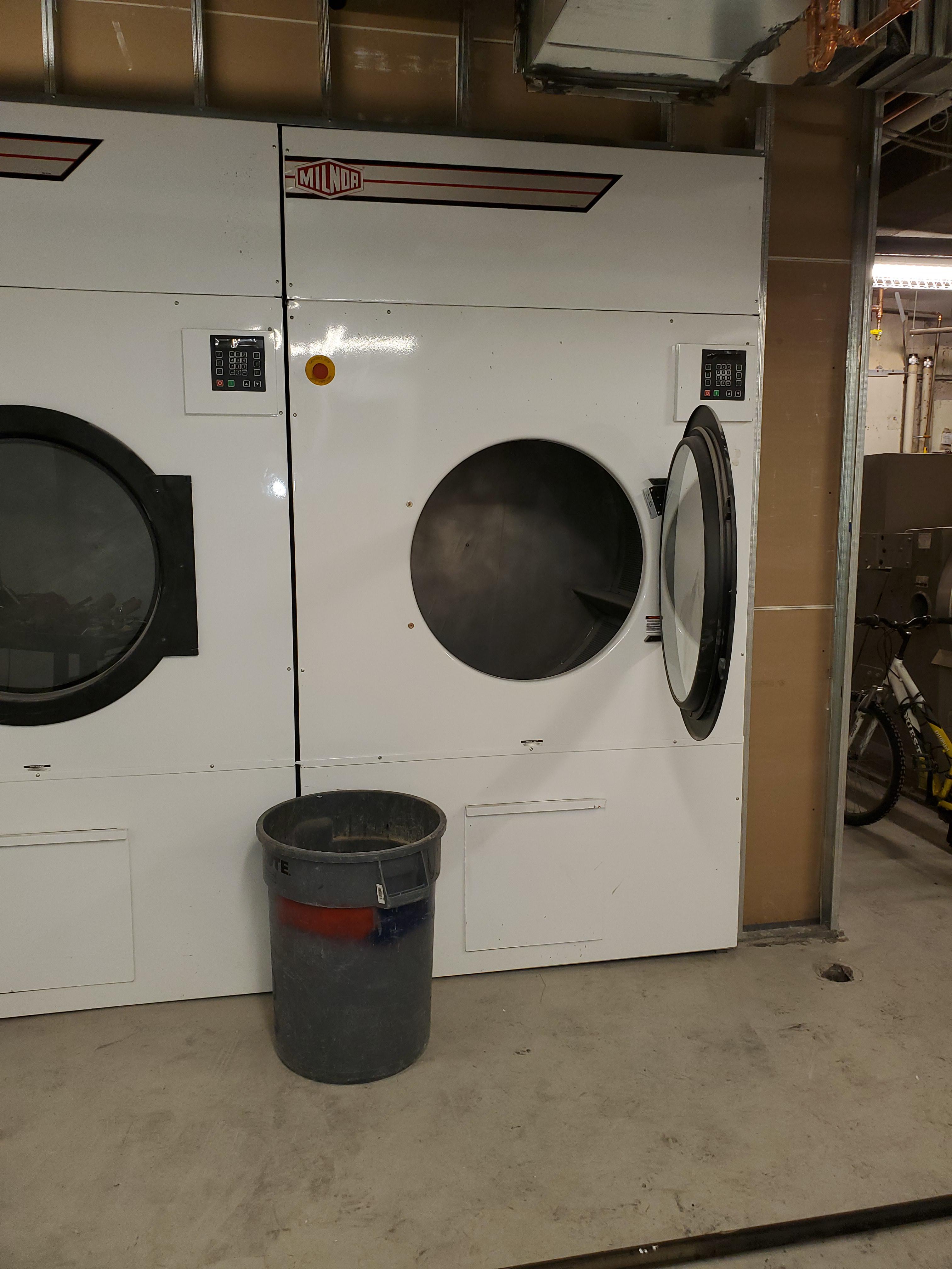 The size of these commercial clothes dryers. r/pics