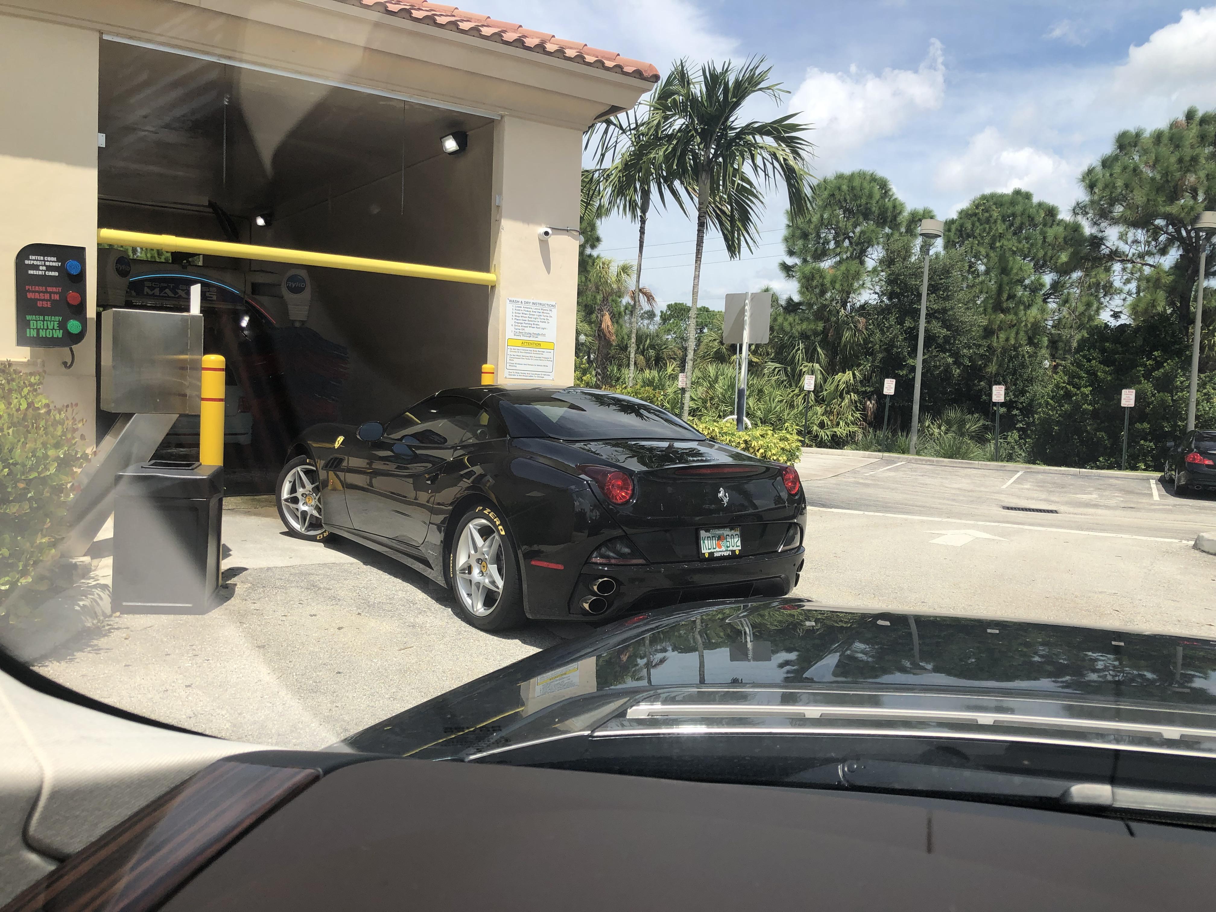 [Ferrari California] going through a gas station car wash r/spotted