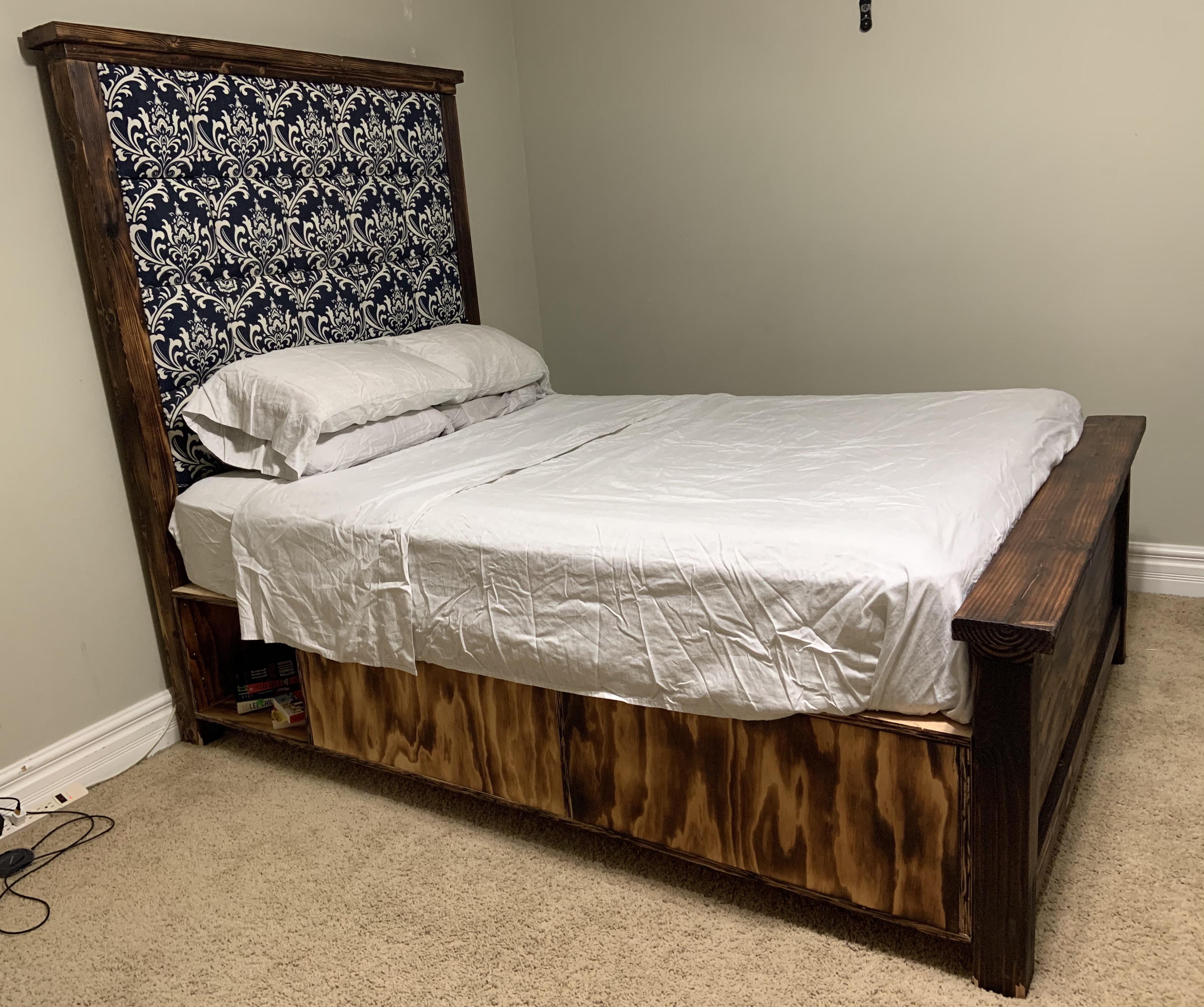 I made a queen farmhouse storage bed with an upholstered headboard and