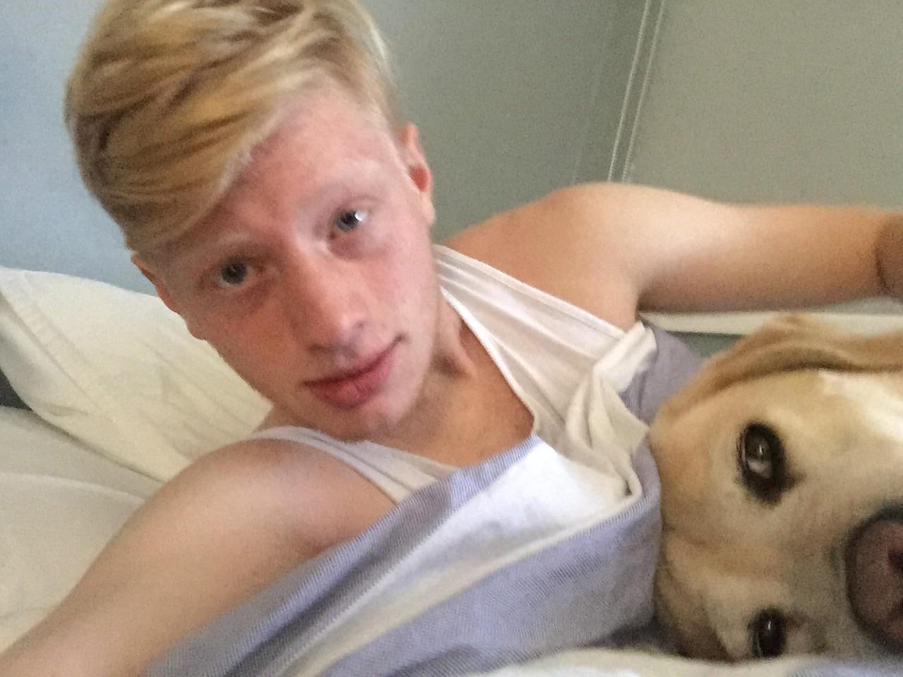 My brother and my dog on the bed r/aww