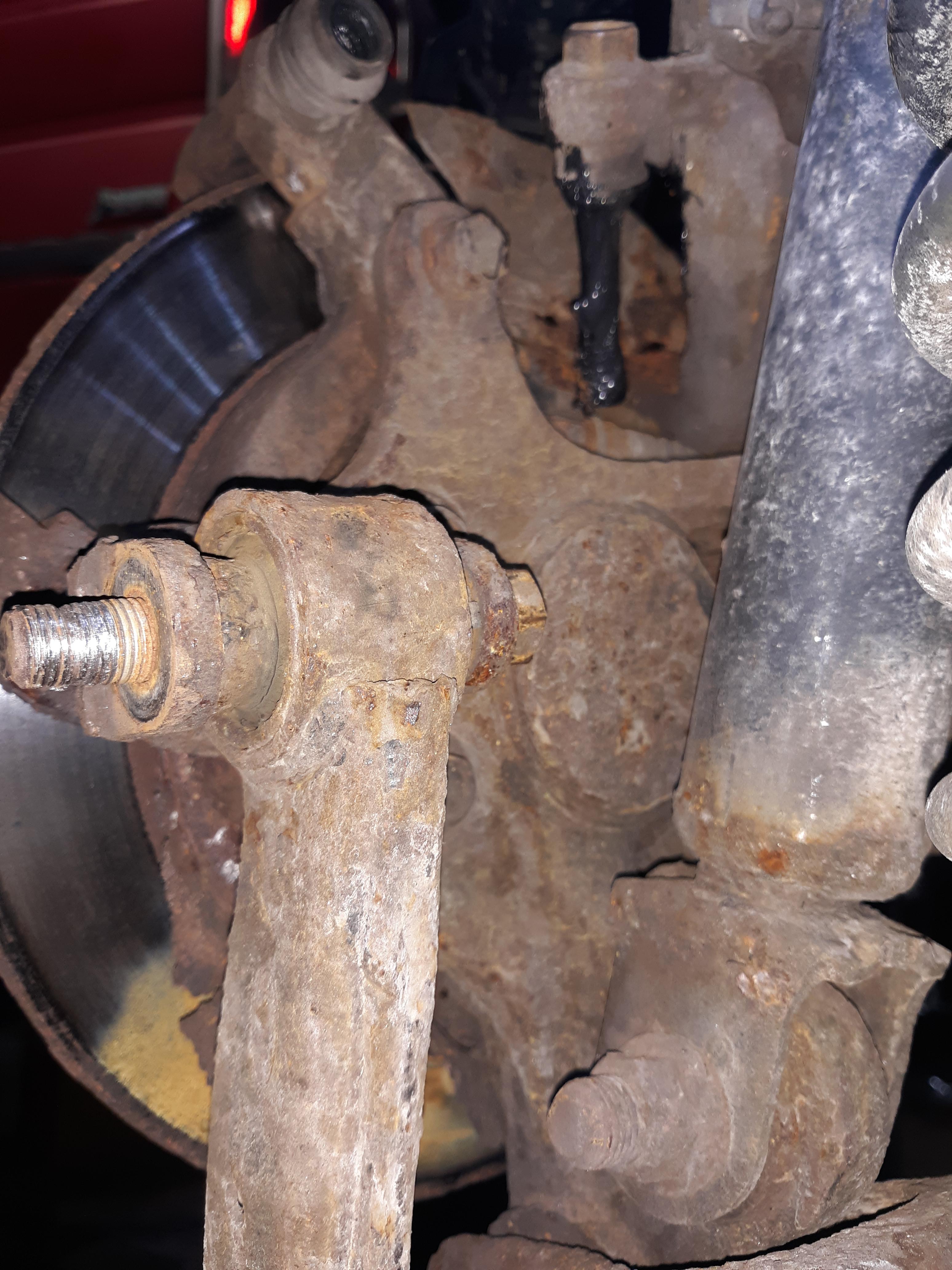 2008 kia Optima rear rotors replacement. Step 1 Remove the conrole arm