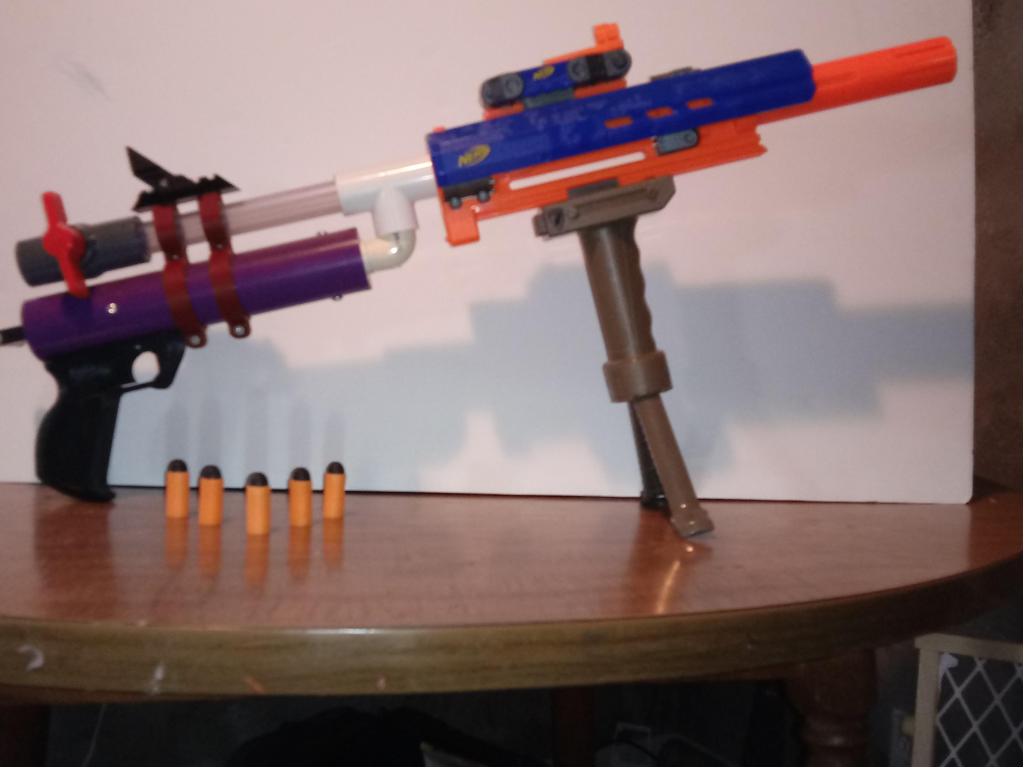 So this is my new rainbow pistol blaster has a k25 spring a longstrike front barrel, original
