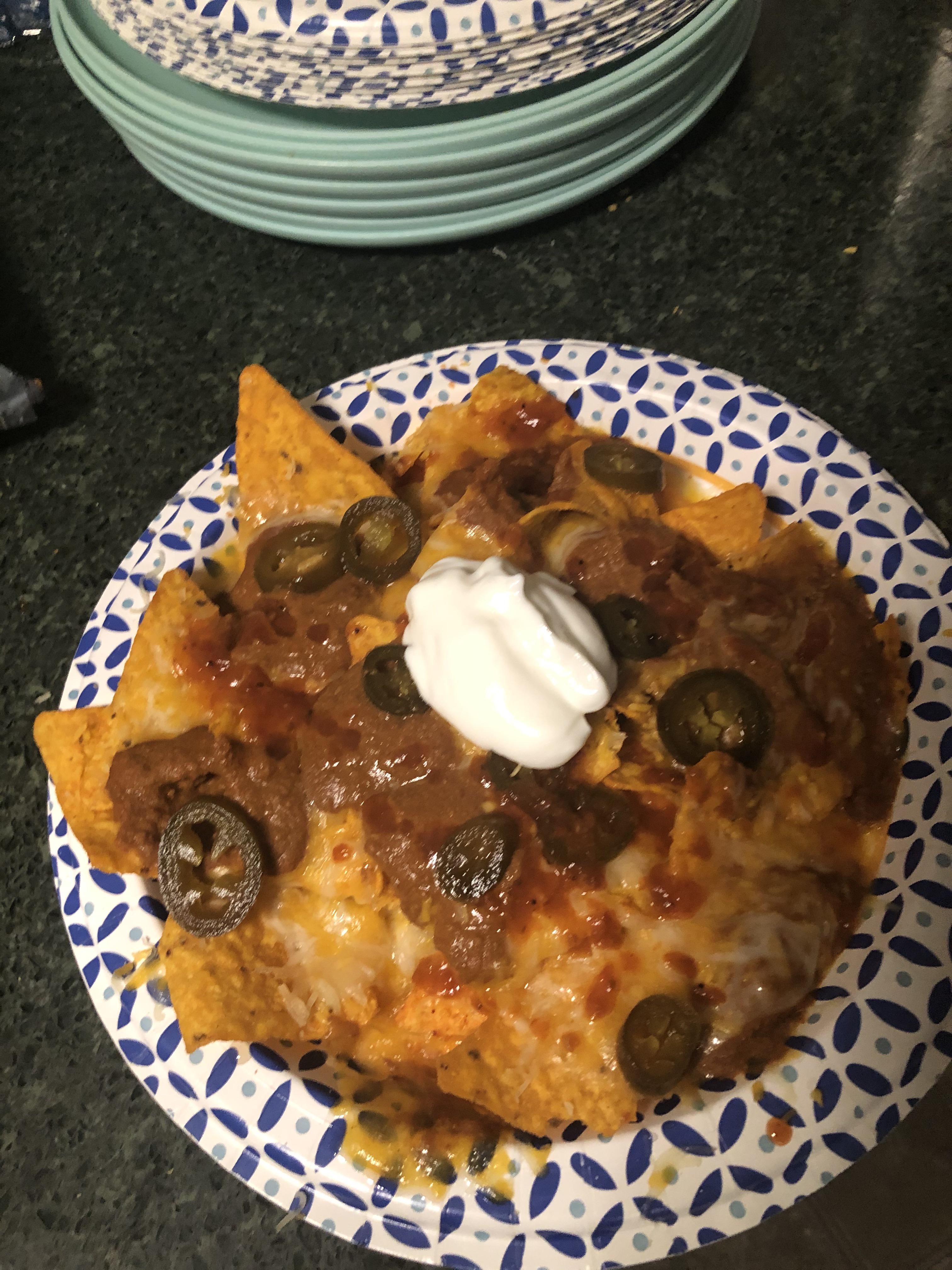 Drunken dorito chili cheese nachos with jalapeños and sour cream r