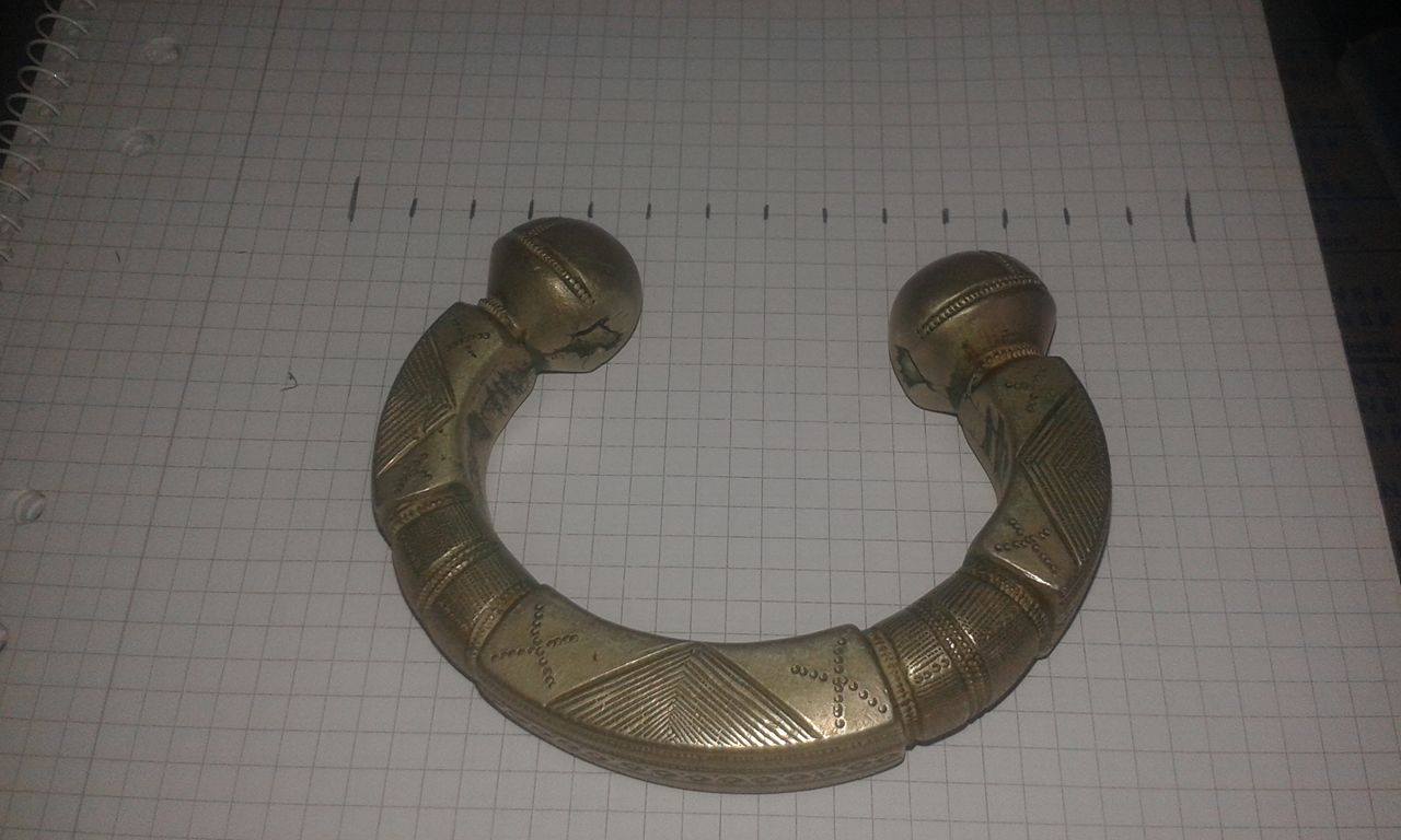 Massive bracelet (?) of some kind, possibly african in origin. Does