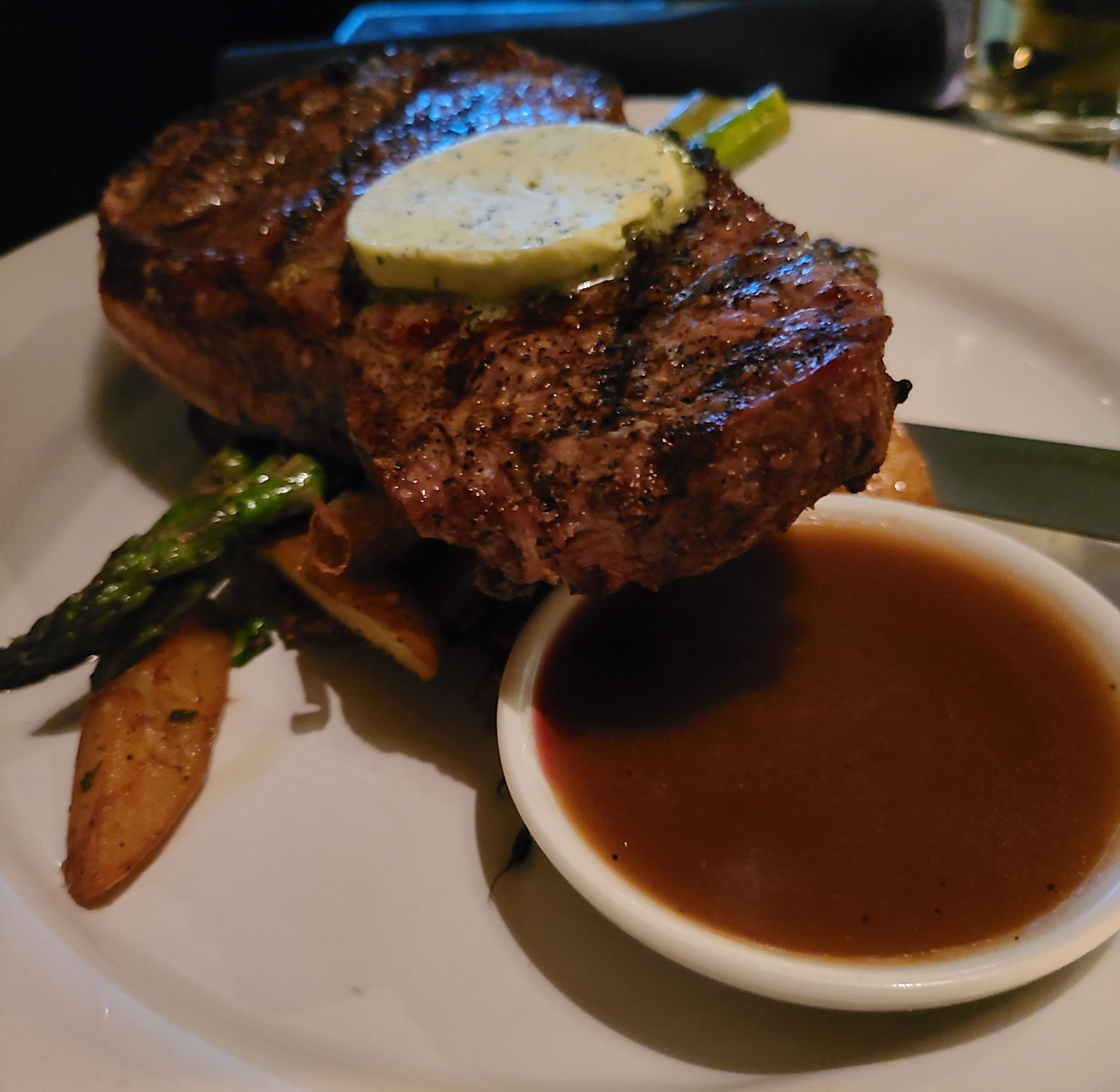 Kansas city prime cut bone in strip steak cooked medium rare r/IAteThis