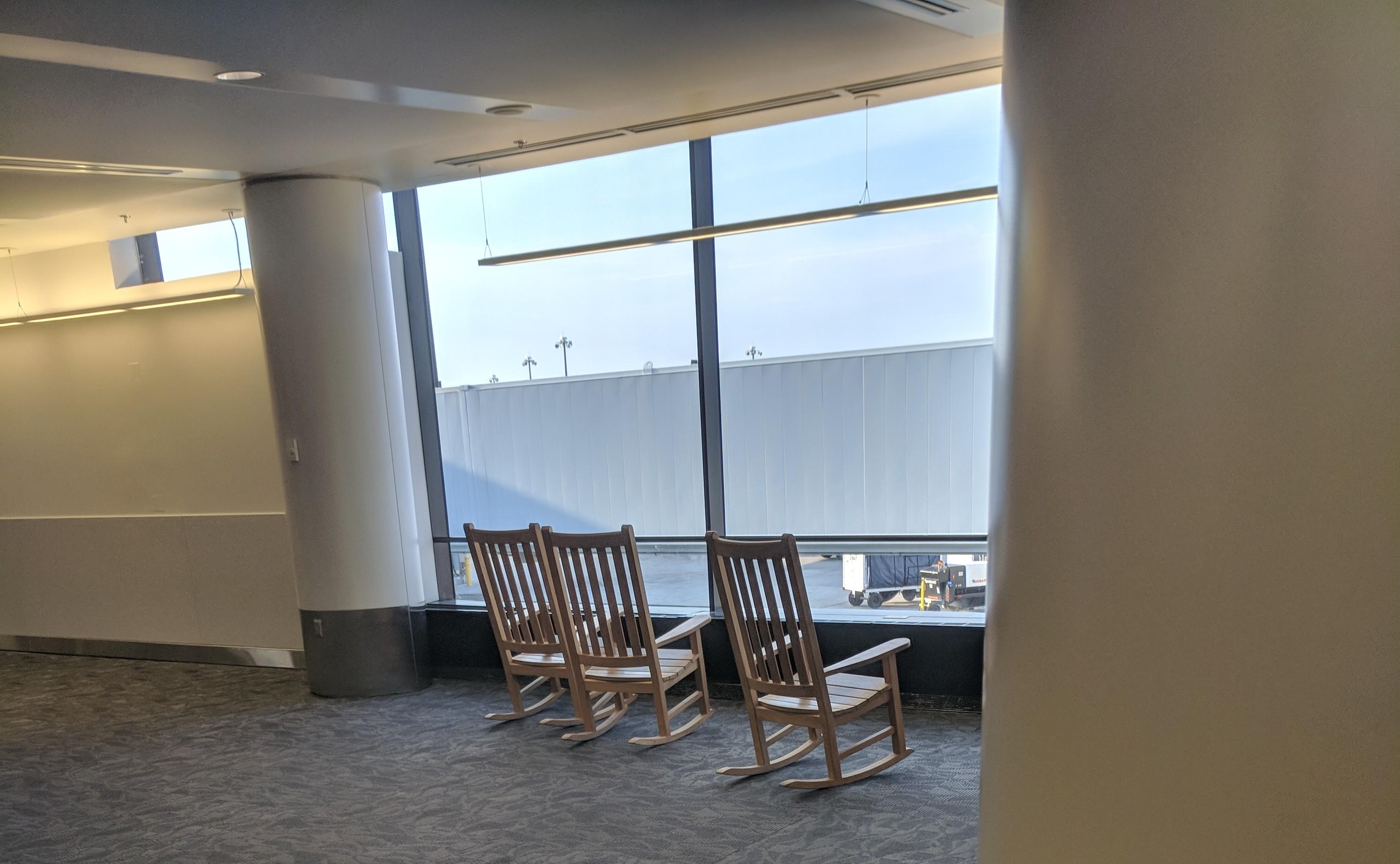 BWI Airport has rocking chairs by the windows. r/mildlyinteresting
