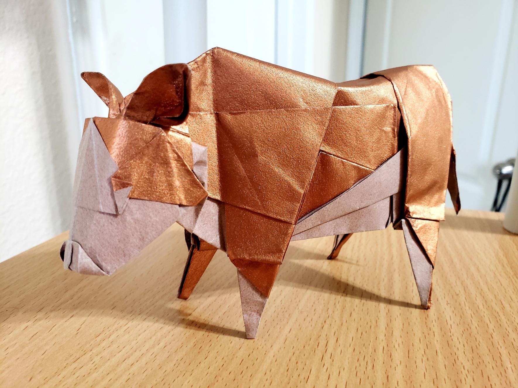Origami Cow (Hereford steer) by roam diaz folded by me r/origami