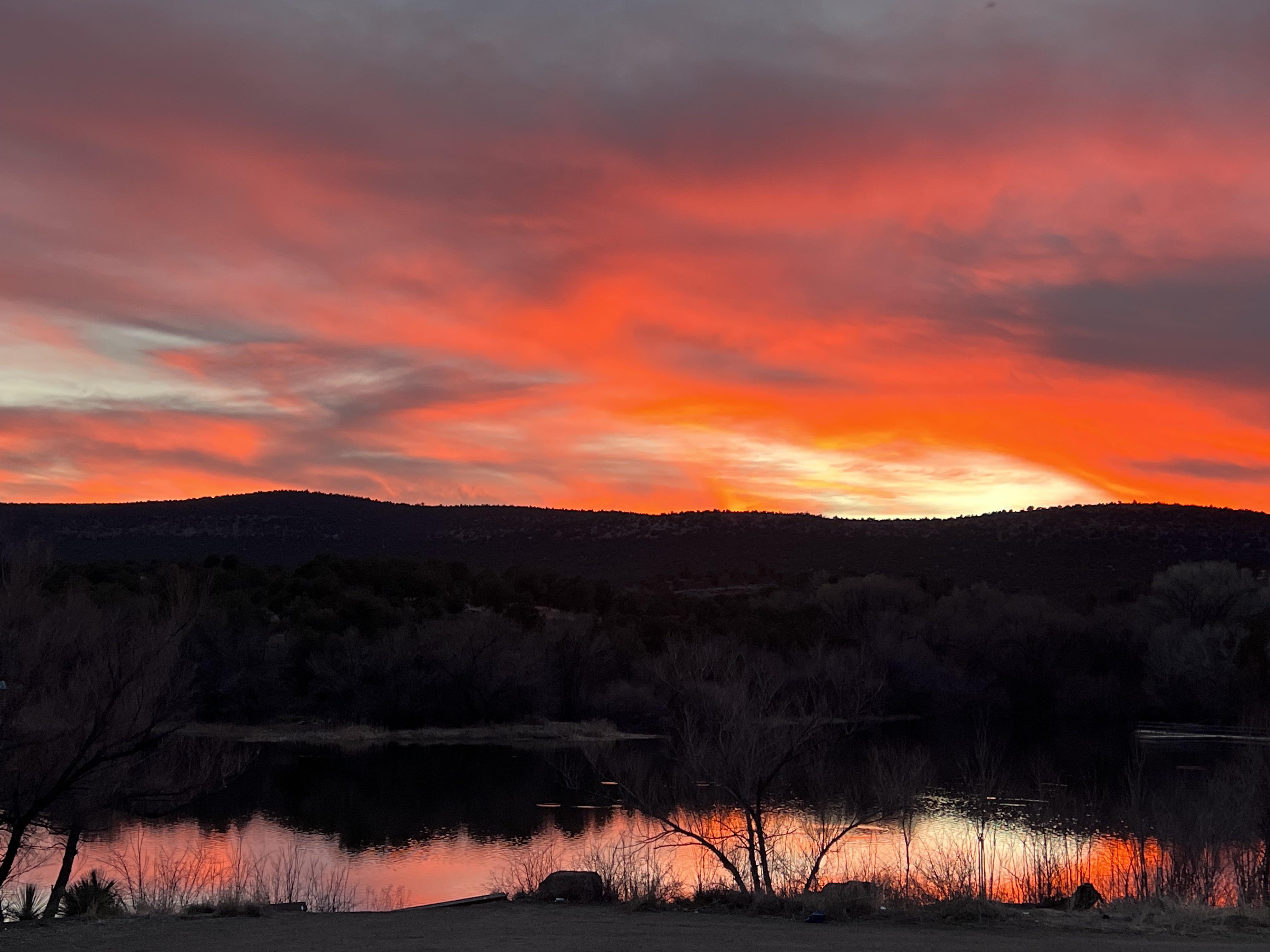 Striking red sunset reflecting on the lake, (Seneca Lake, AZ). r/arizona