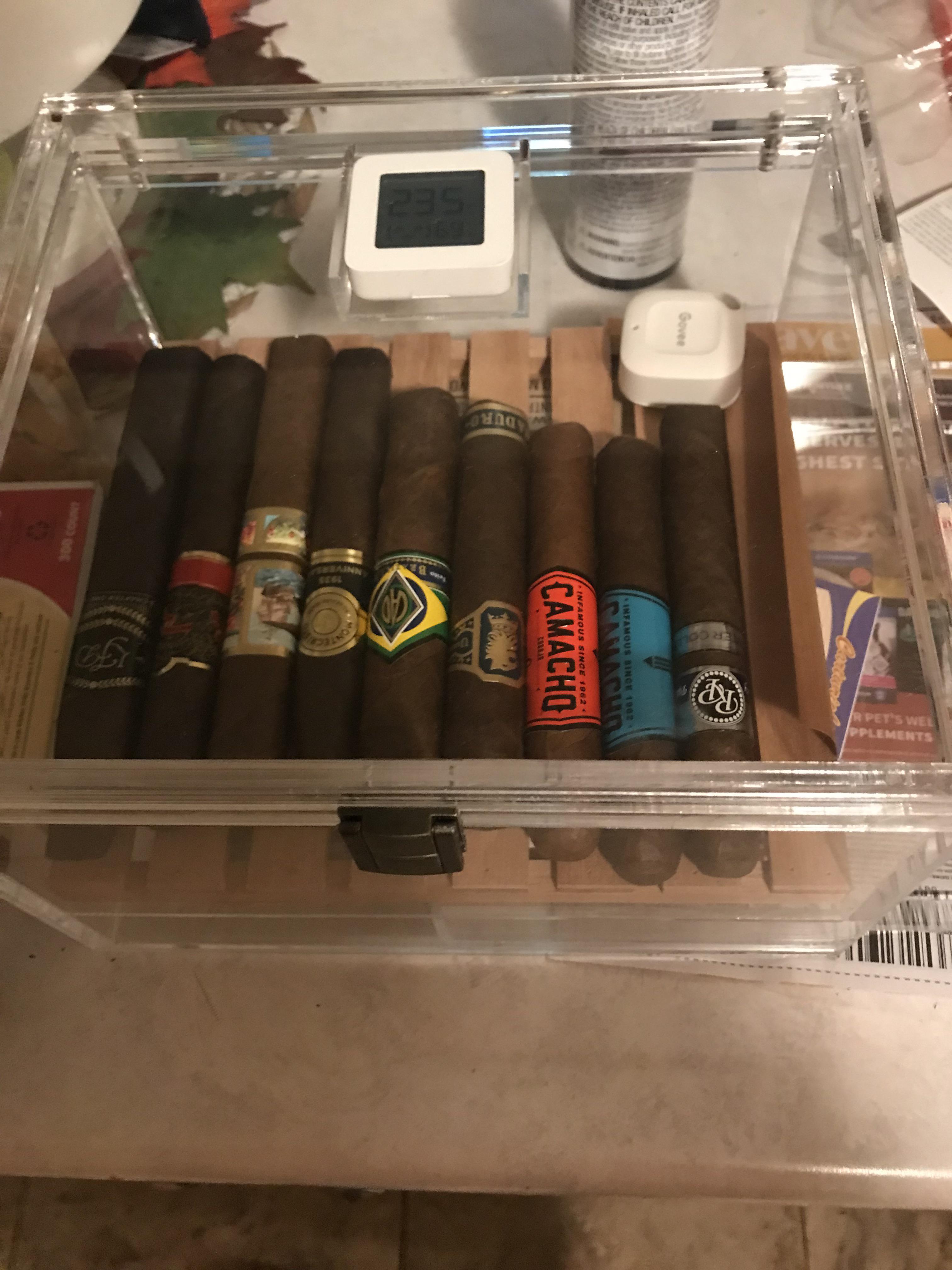 Finally bought a real humidor. Acrylic off Amazon, but happy with it. I