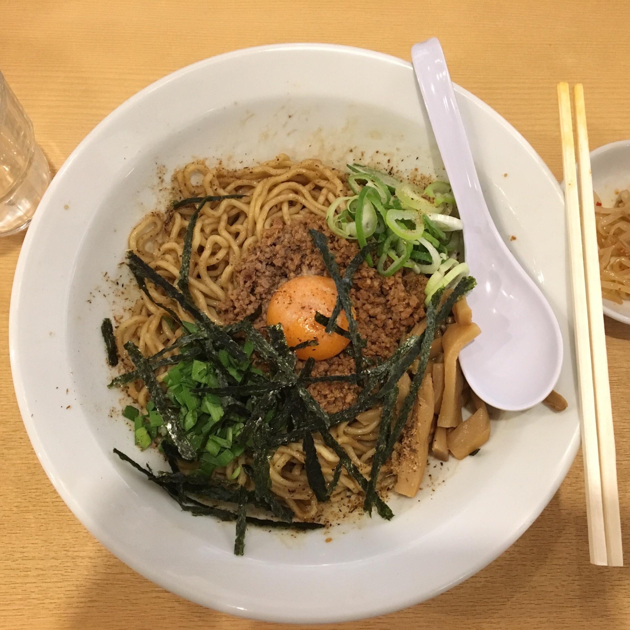 Taiwan Mazesoba soupless ramen topped with seaweed, egg yolk, green