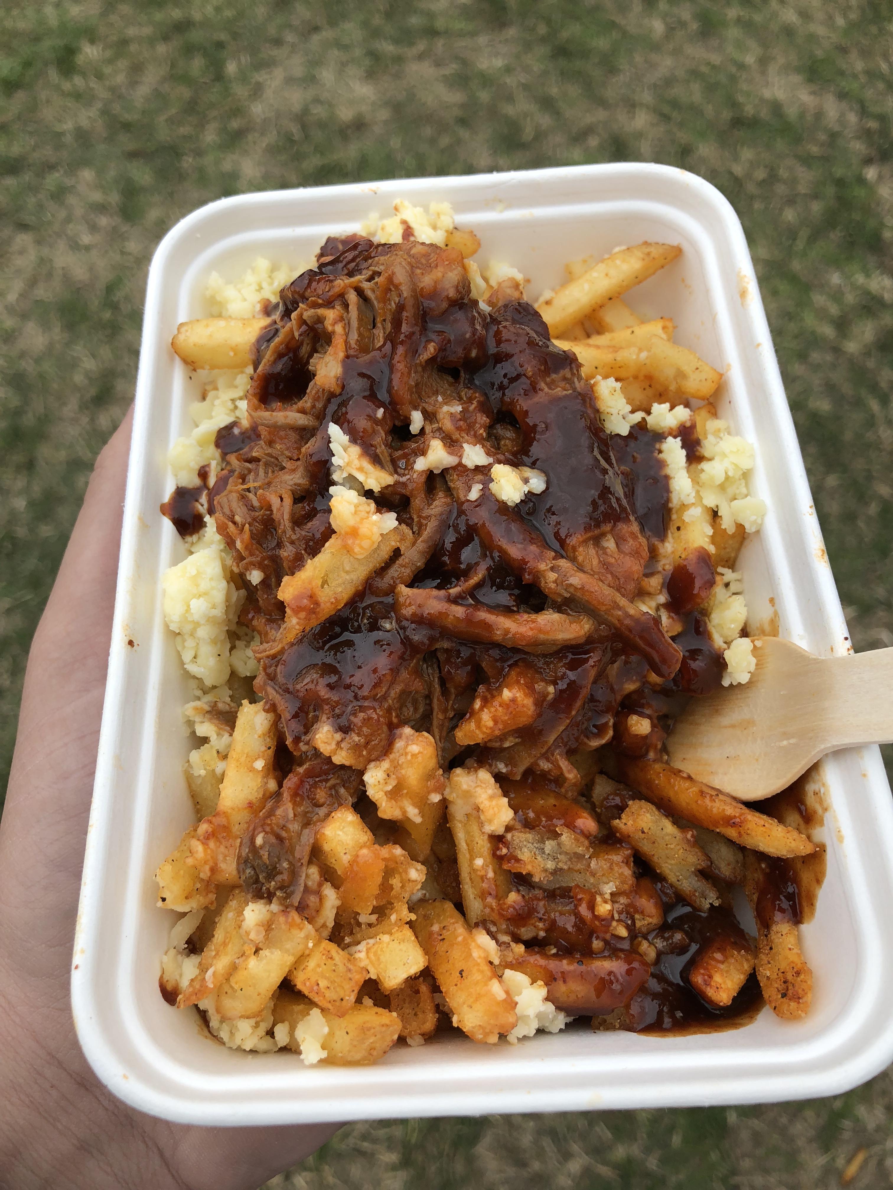 [I ate] loaded fries with pulled beef brisket, smoked cheddar cheese
