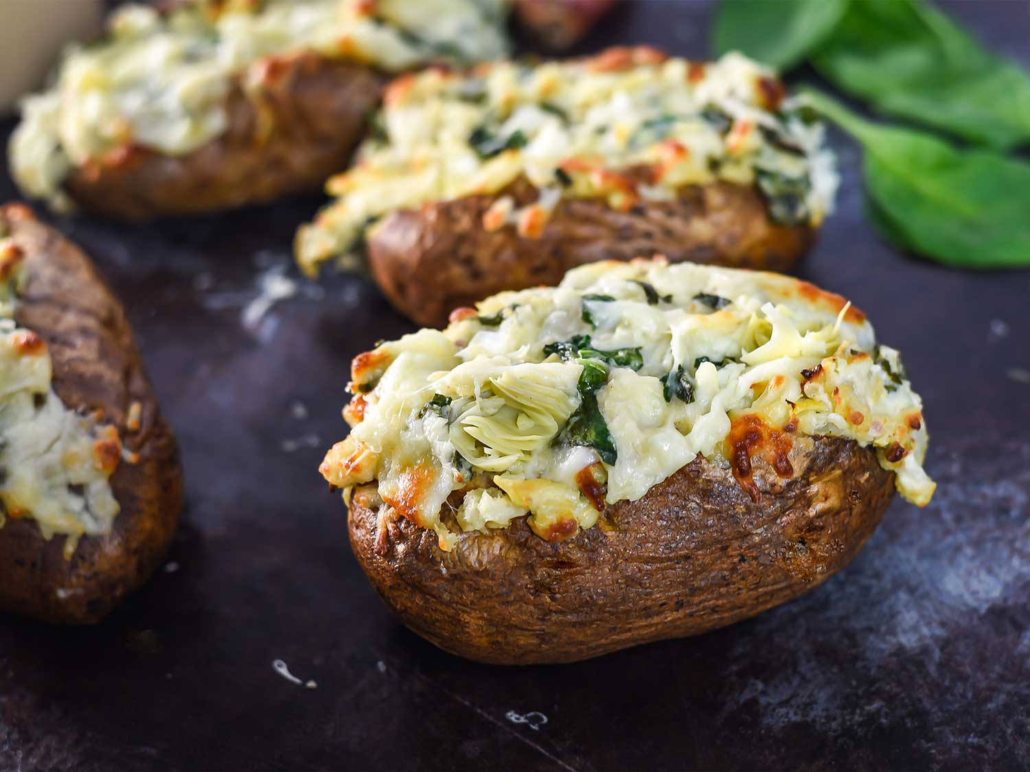 Spinach and Artichoke Baked Potatoes Recipe in comments [OC] [1500 x