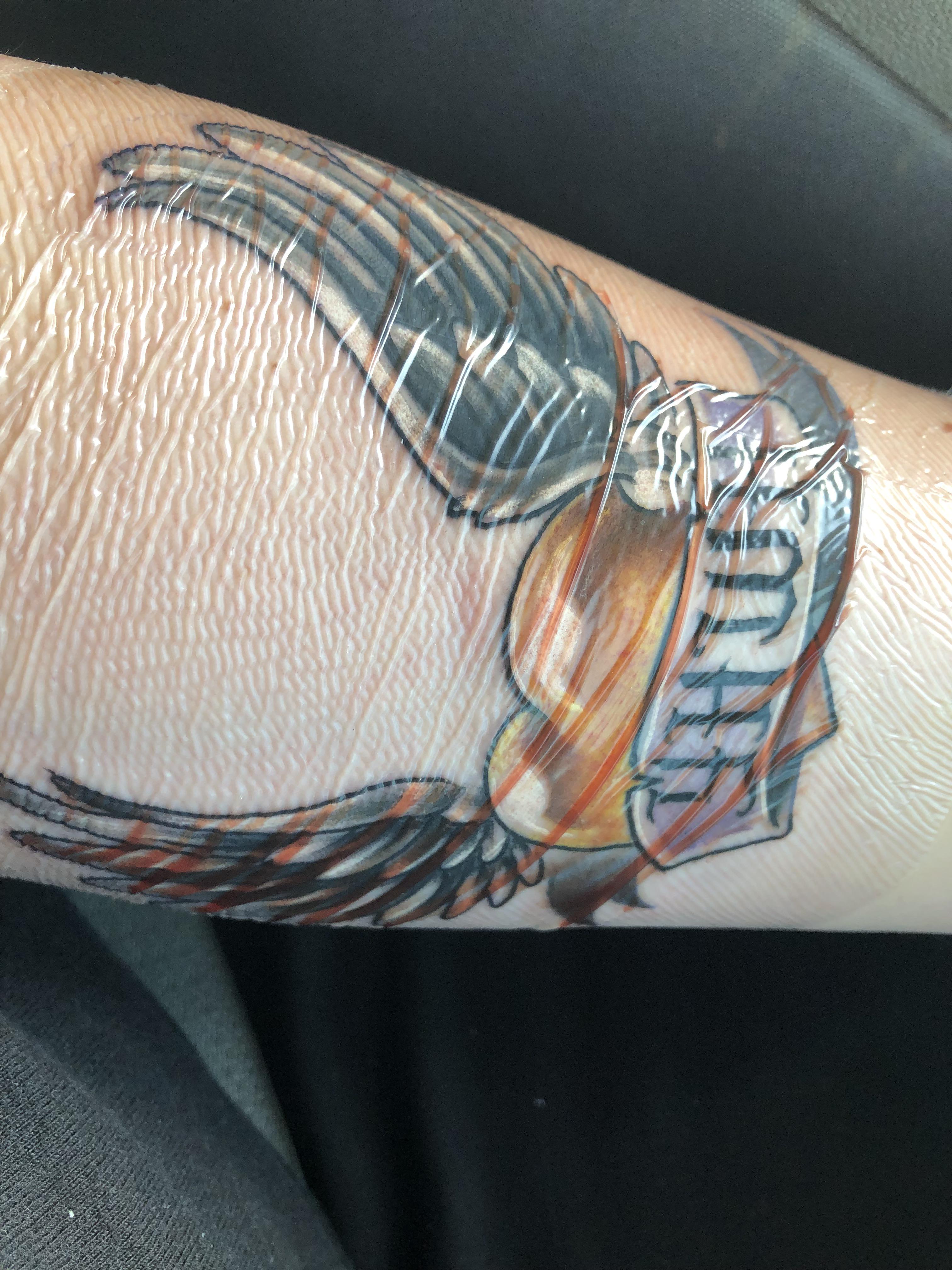 First tattoo, Golden Heart of God, I got at Strange Daze tattoos in