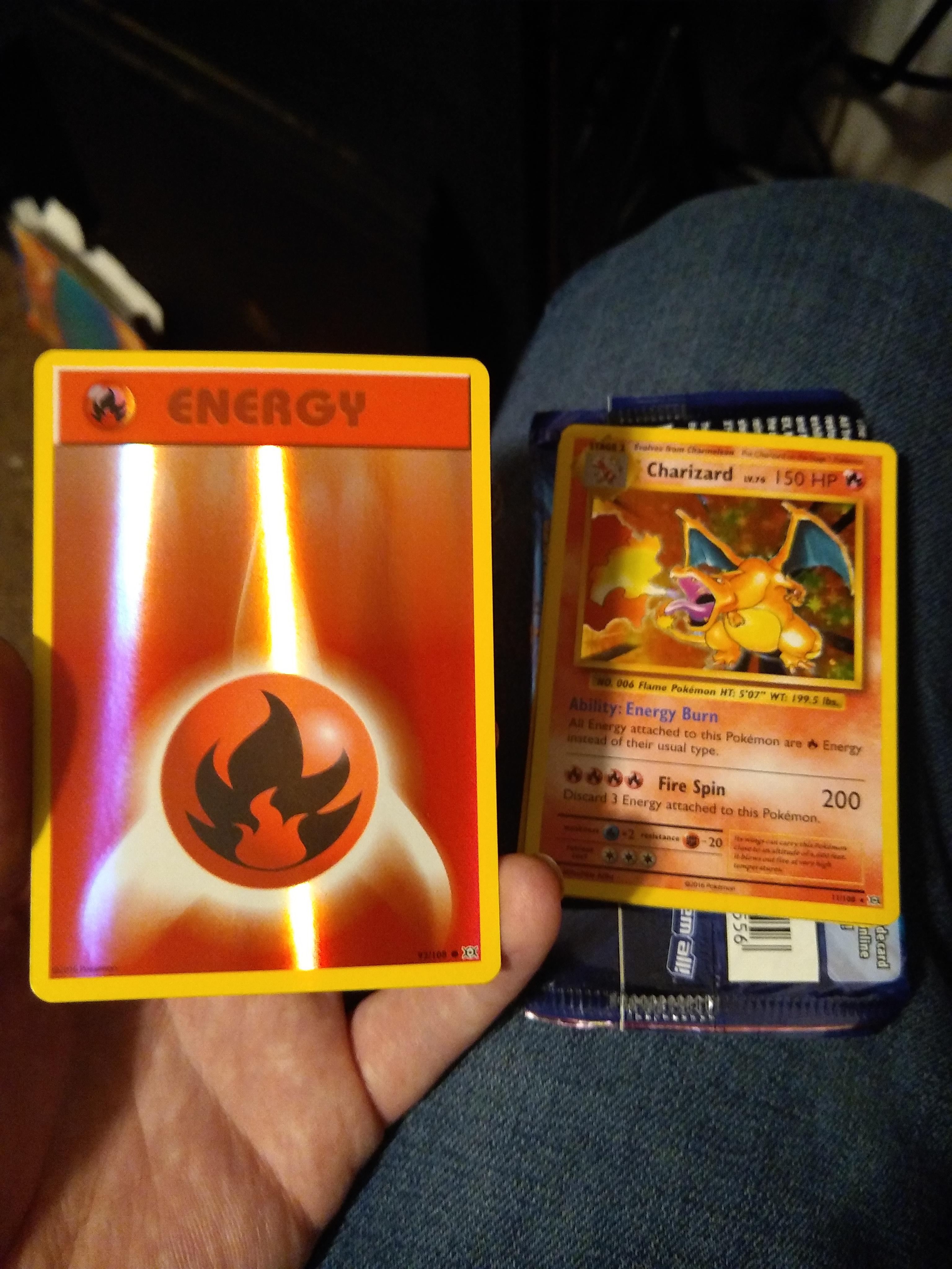 OMG! Look at the reverse holo fire energy I just pulled. So shiny. r