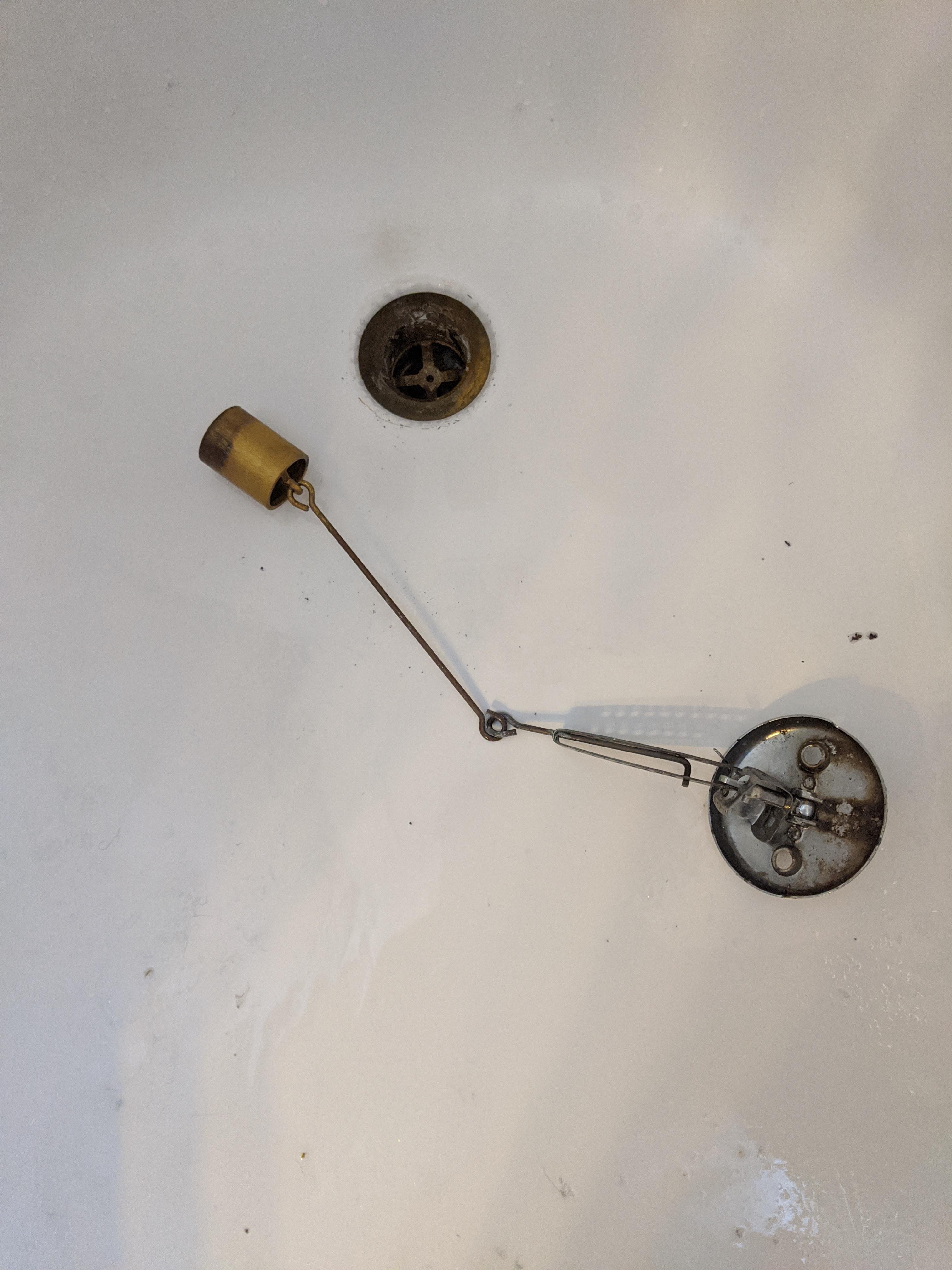 Lift Bucket tub drain won't stay open. Google has failed me. r/Plumbing