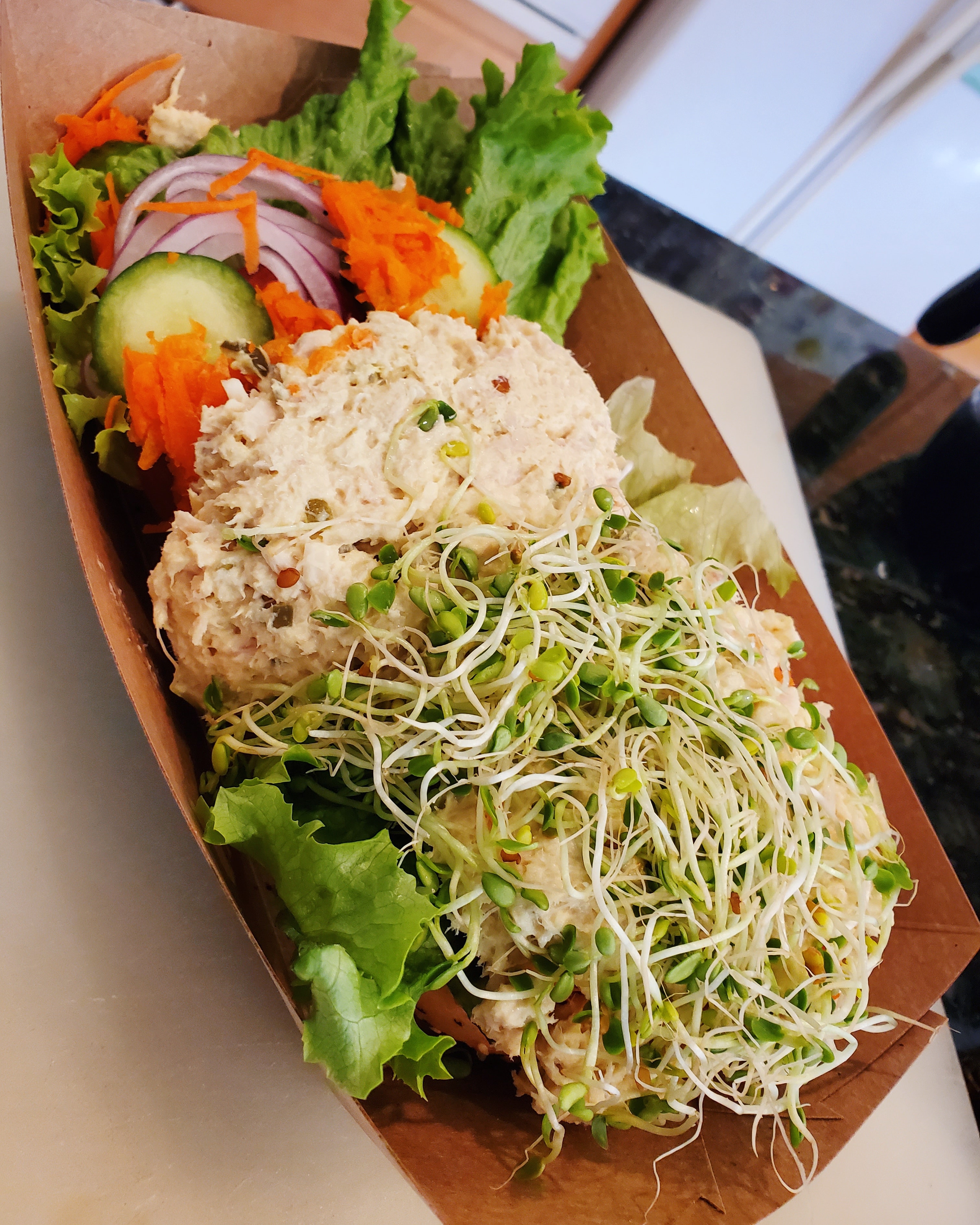 Delicious tuna bagel open faced sandwich at Bagel and Bean in Lincoln