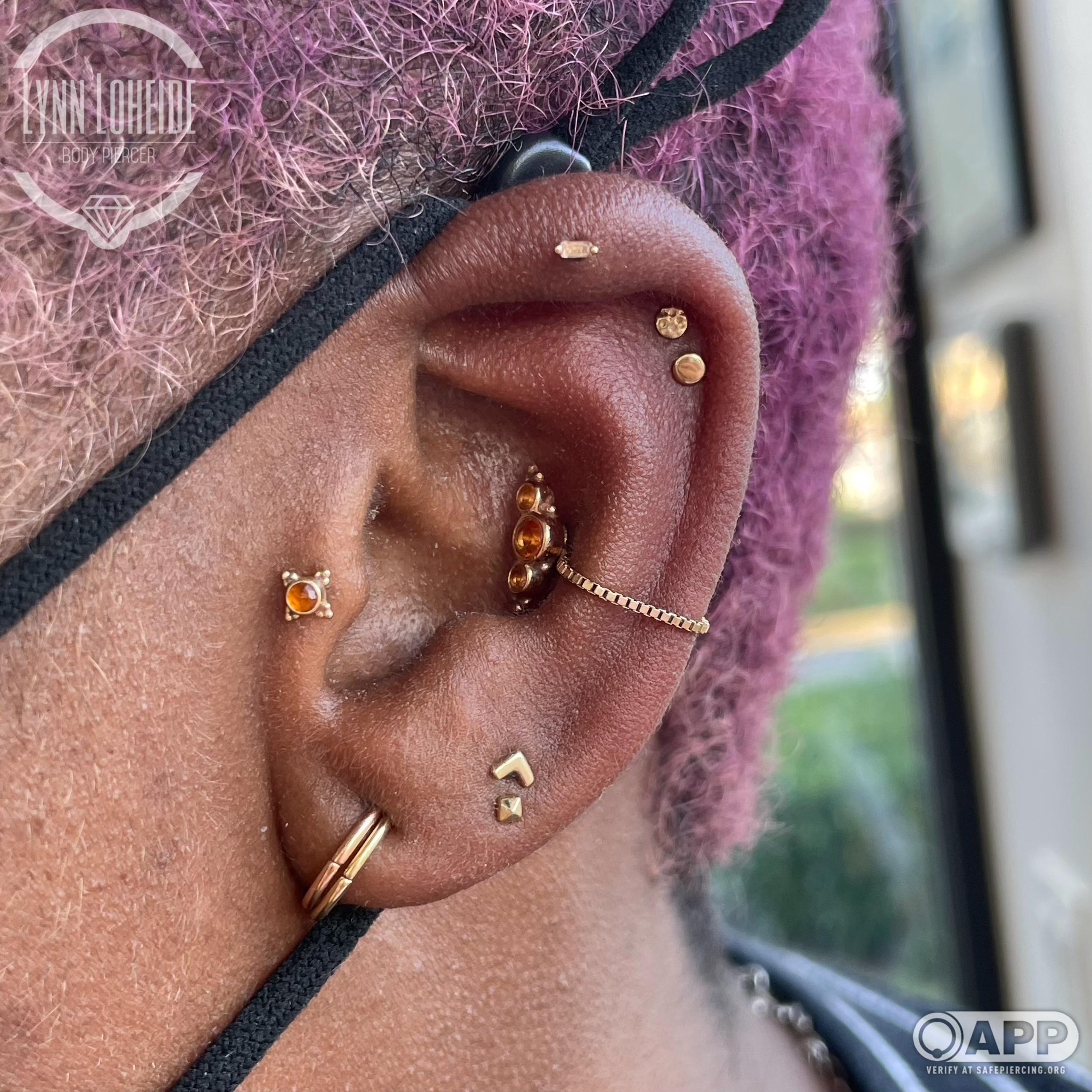 Full ear of bvla, Buddha, and anatometal by margo and Lynn at sweet