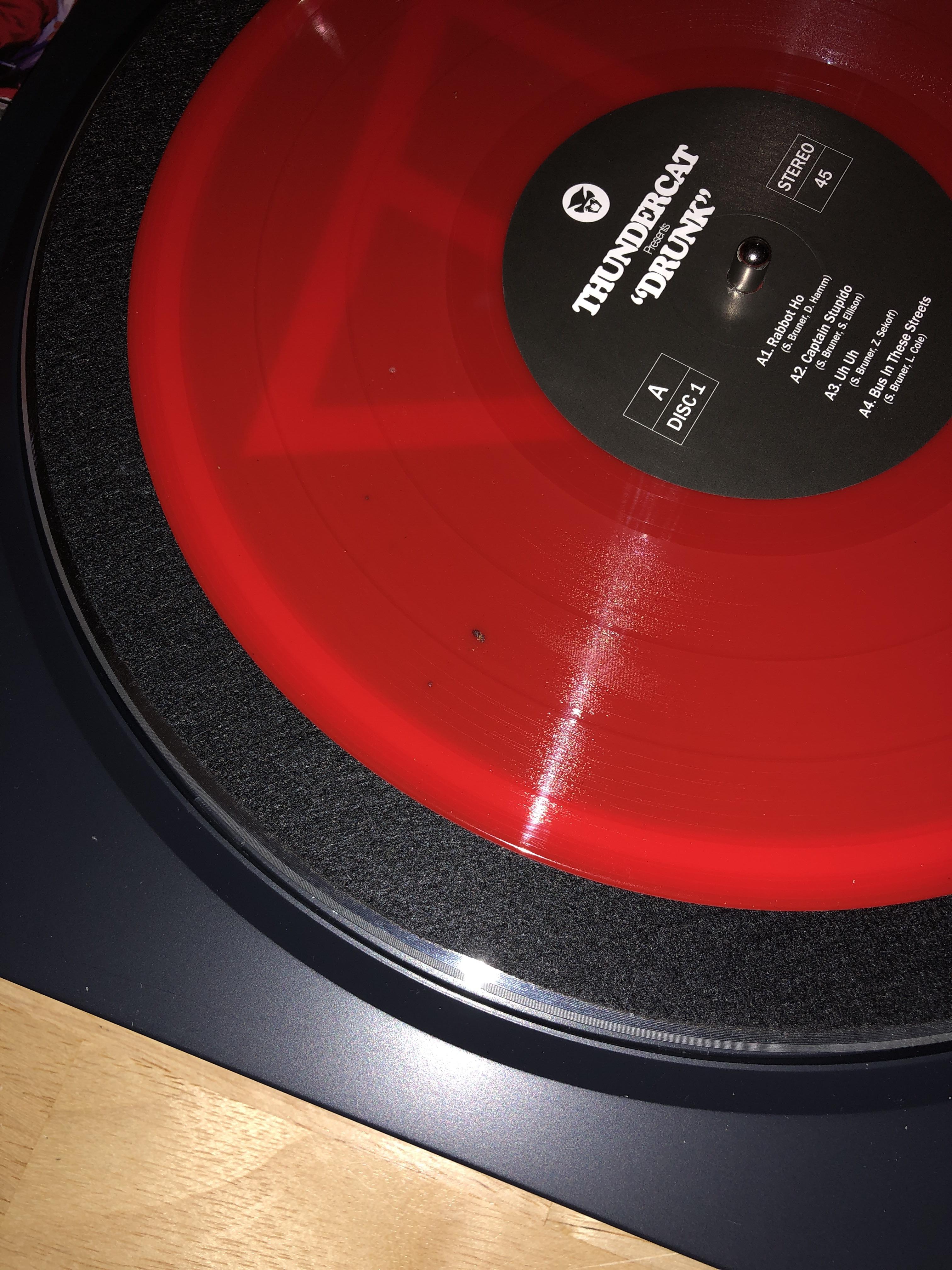 Does anyone know what these black specks are on the record and what I