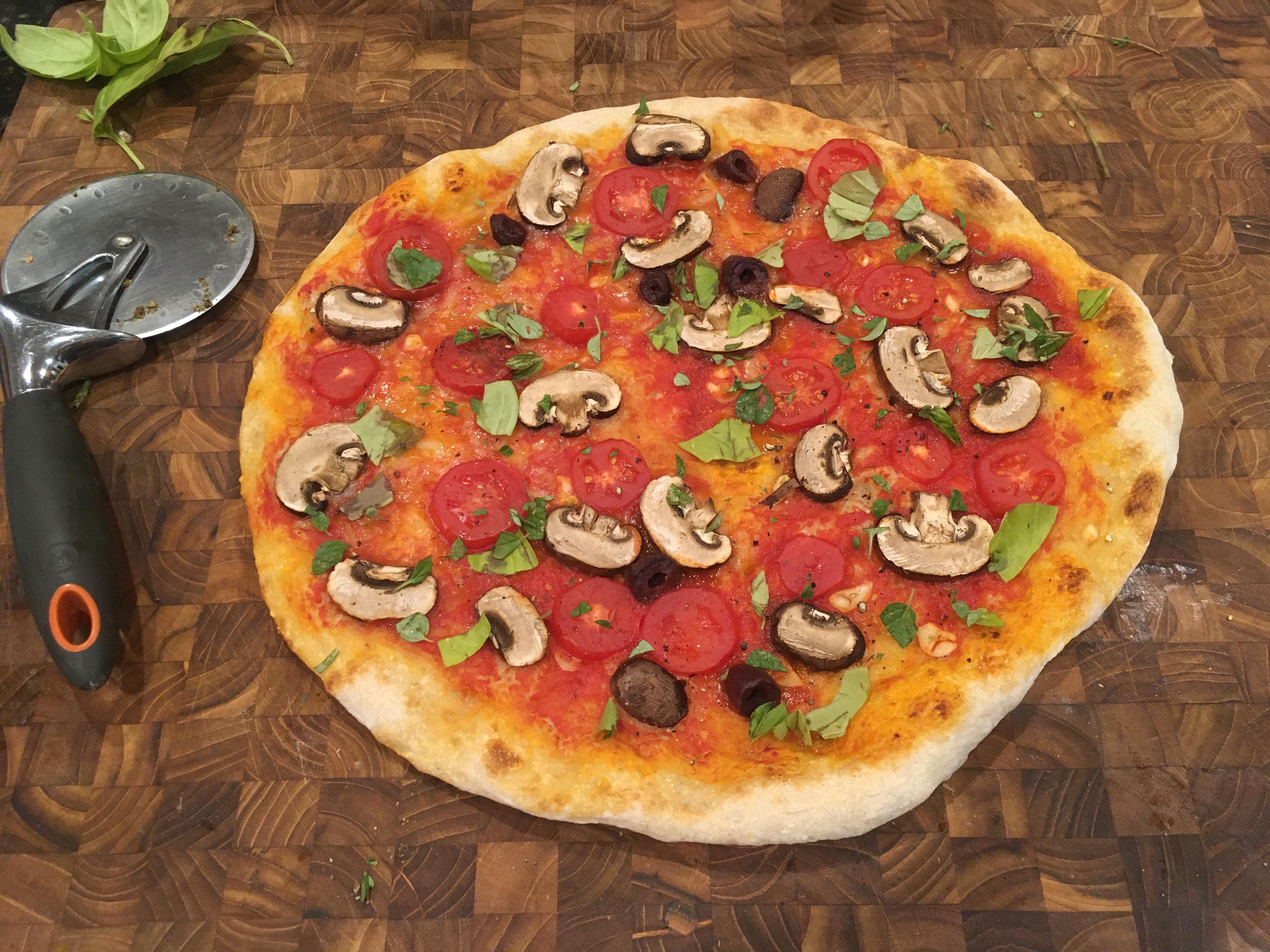 Tomato and mushroom pizza. San Marzano sauce made from tomatoes from my