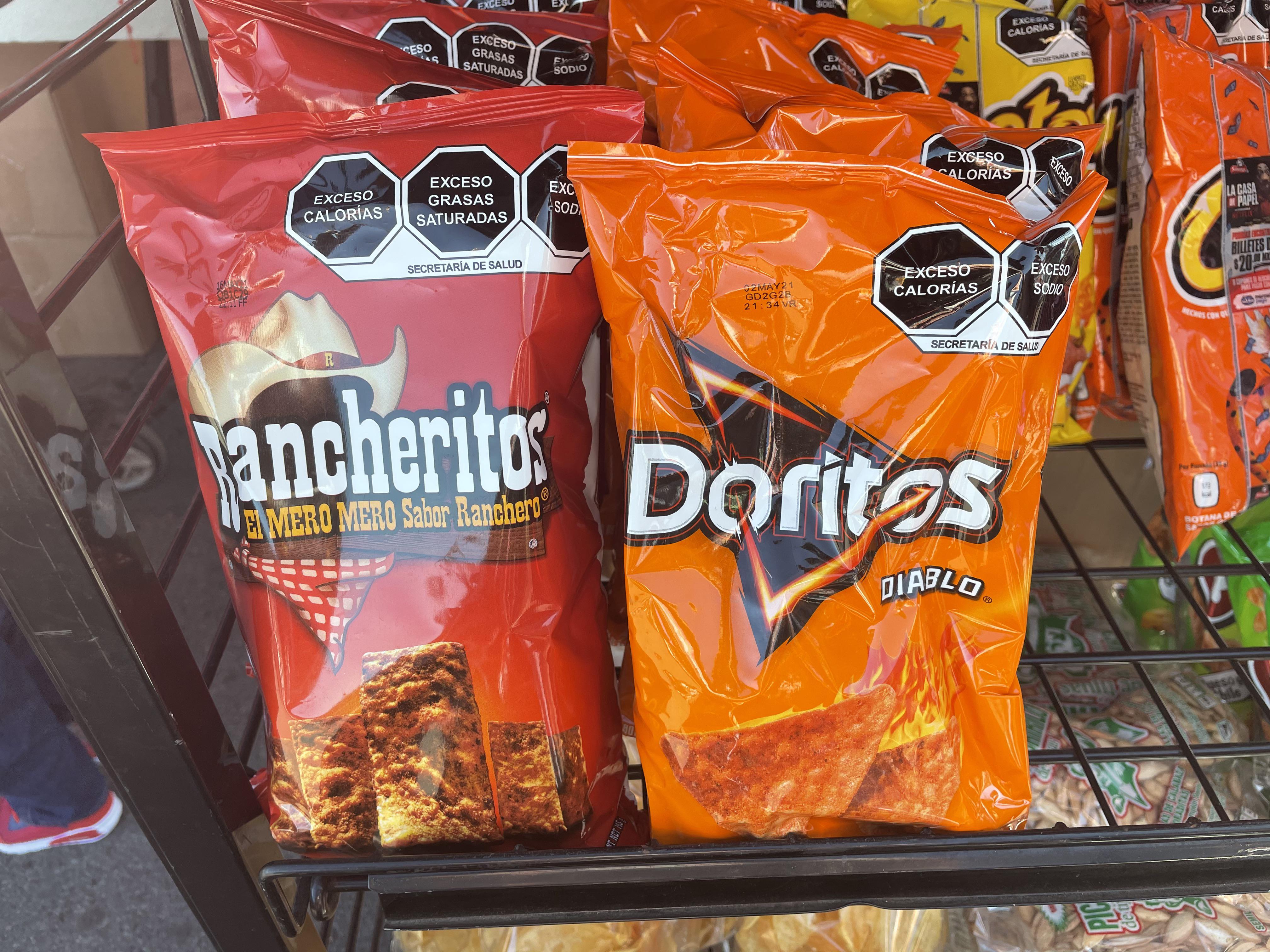 Mexican chips feature prominent health warnings in front of the bags