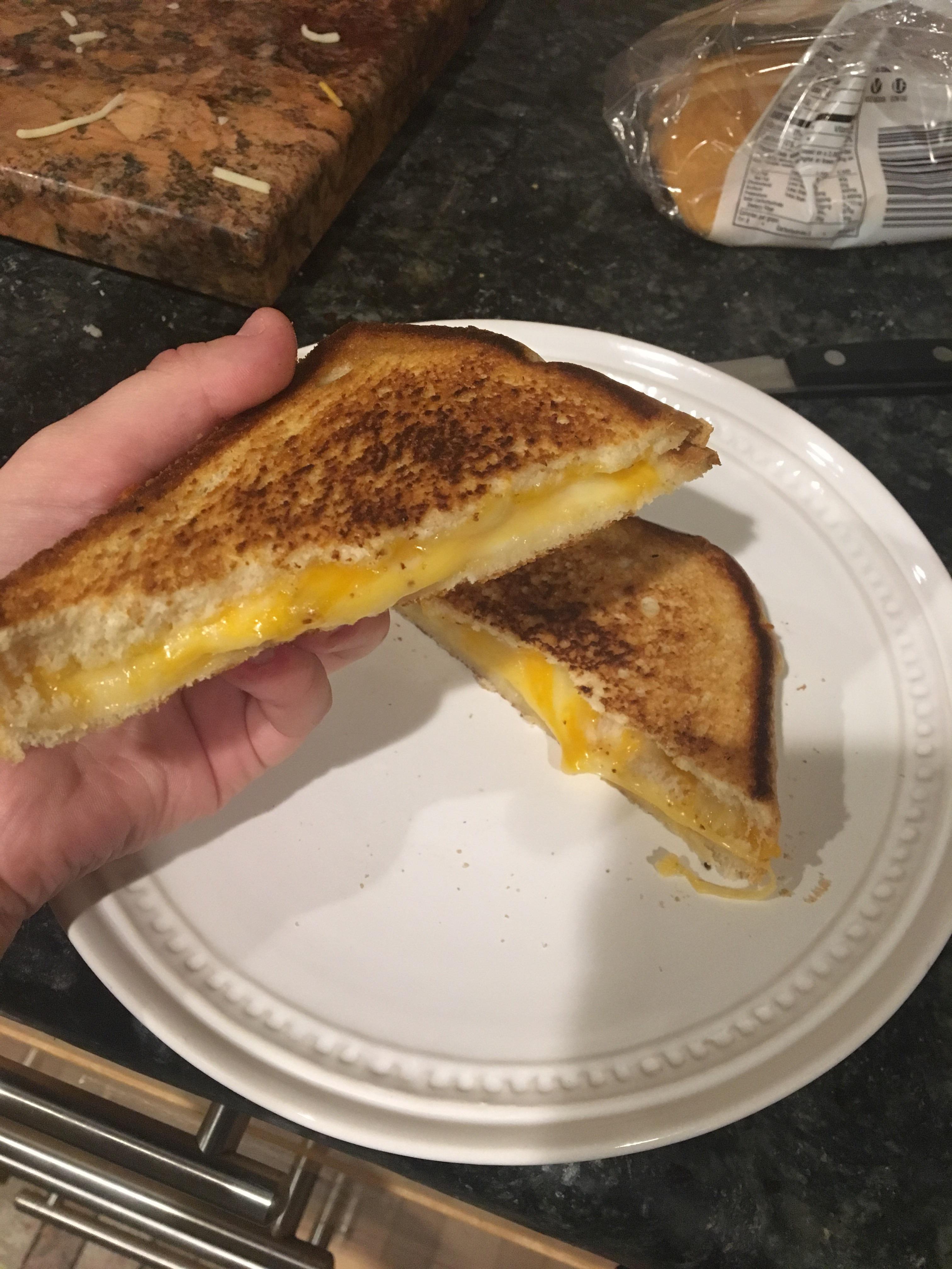 Only had shredded cheese, but I made it work. r/grilledcheese
