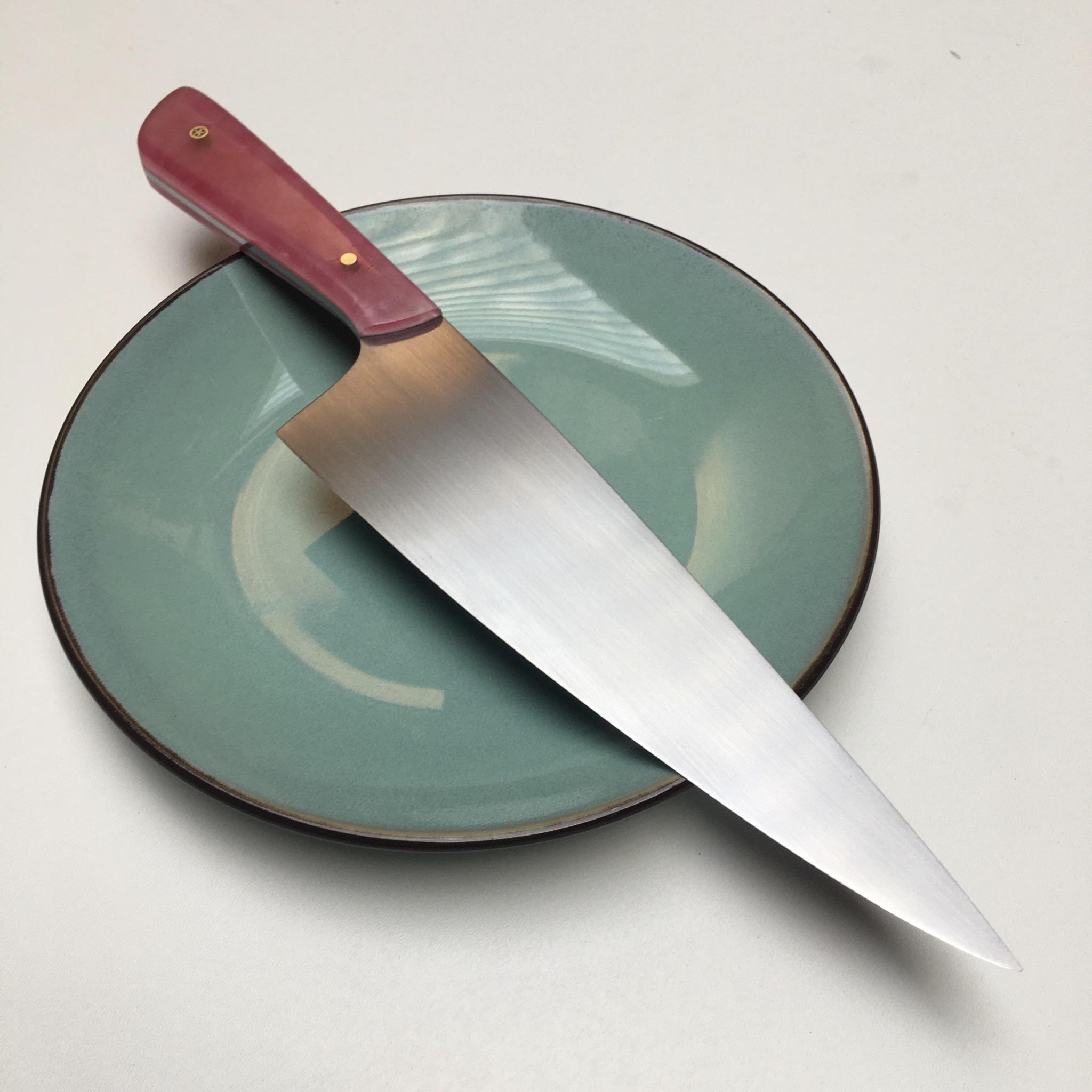 Felt the need to make a happy knife. Made from a discarded circular