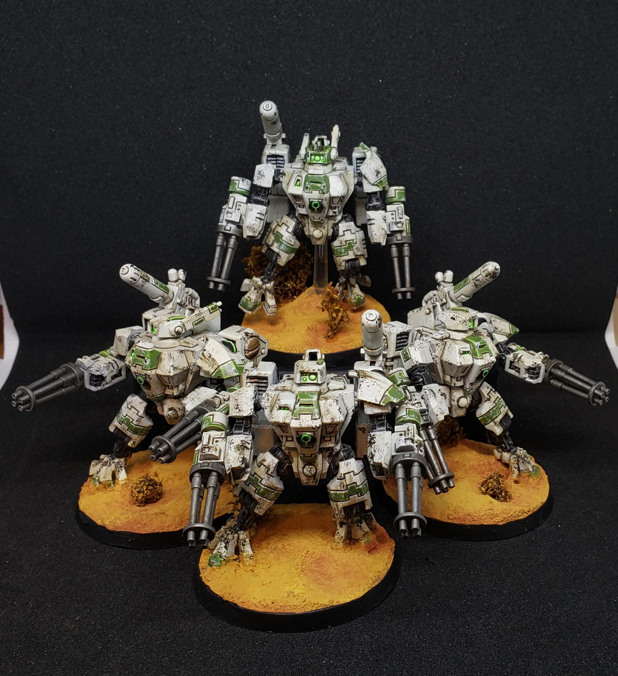 More dirty Tau! Finished some XV8 crisis suits. r/Tau40K