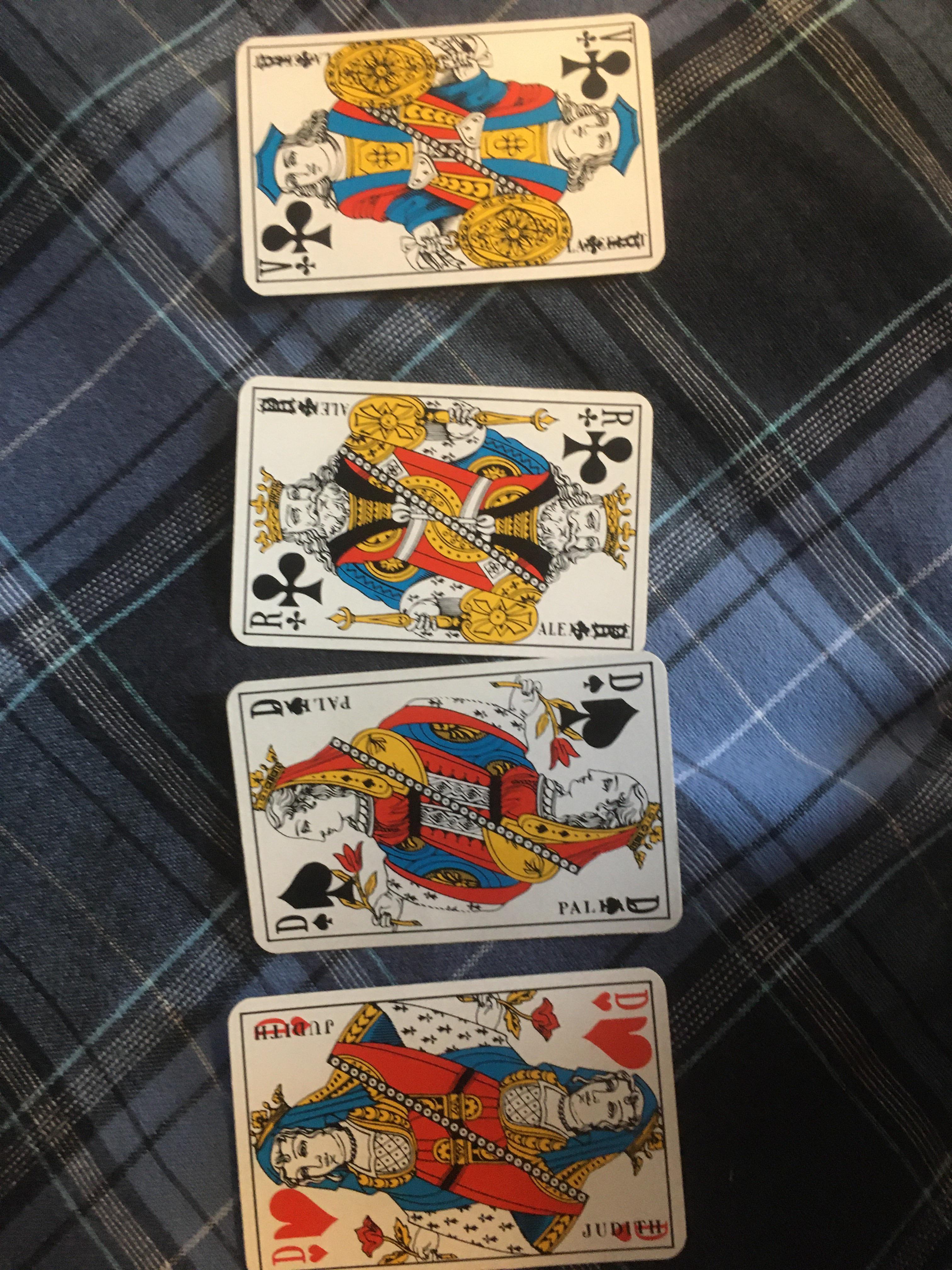 Some of the text on this French card deck’s face cards is overwritten