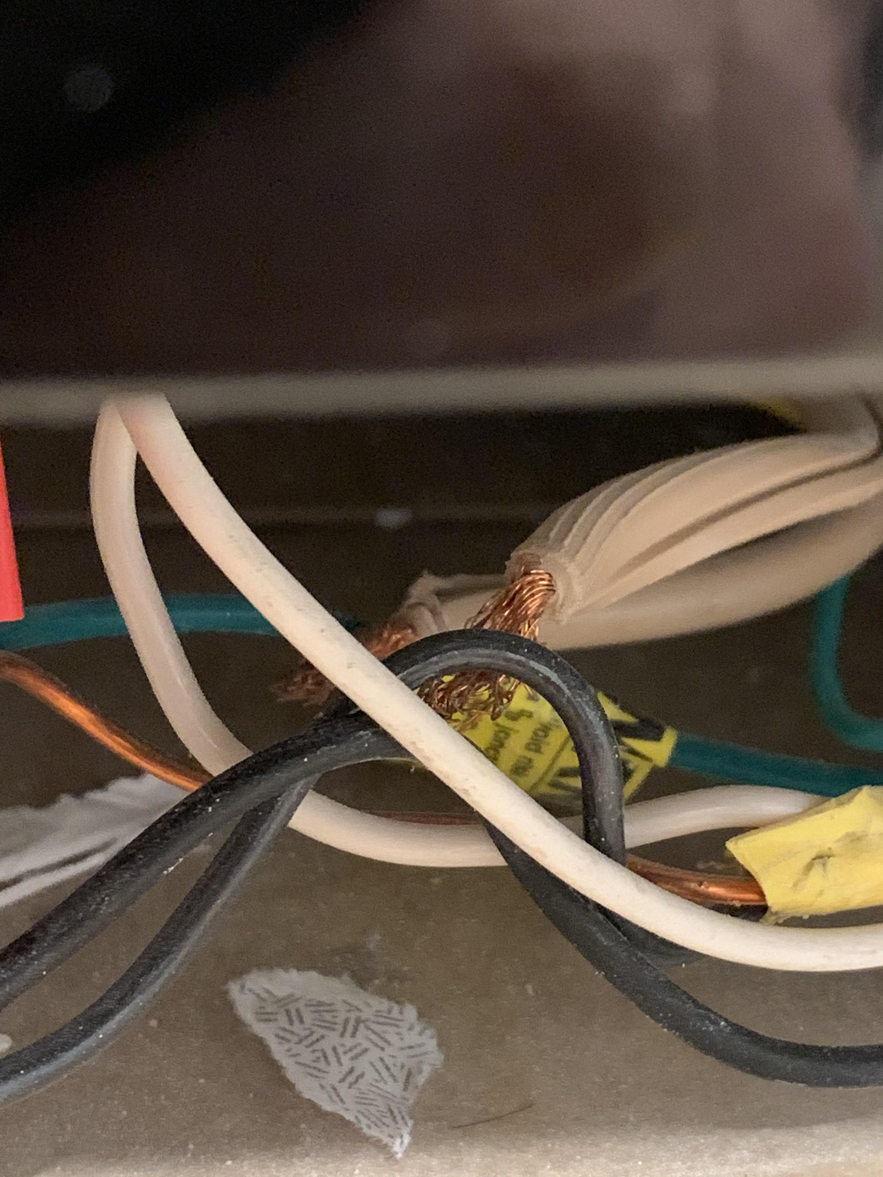 Dishwasher electric cables exposed. What do i do? electricians