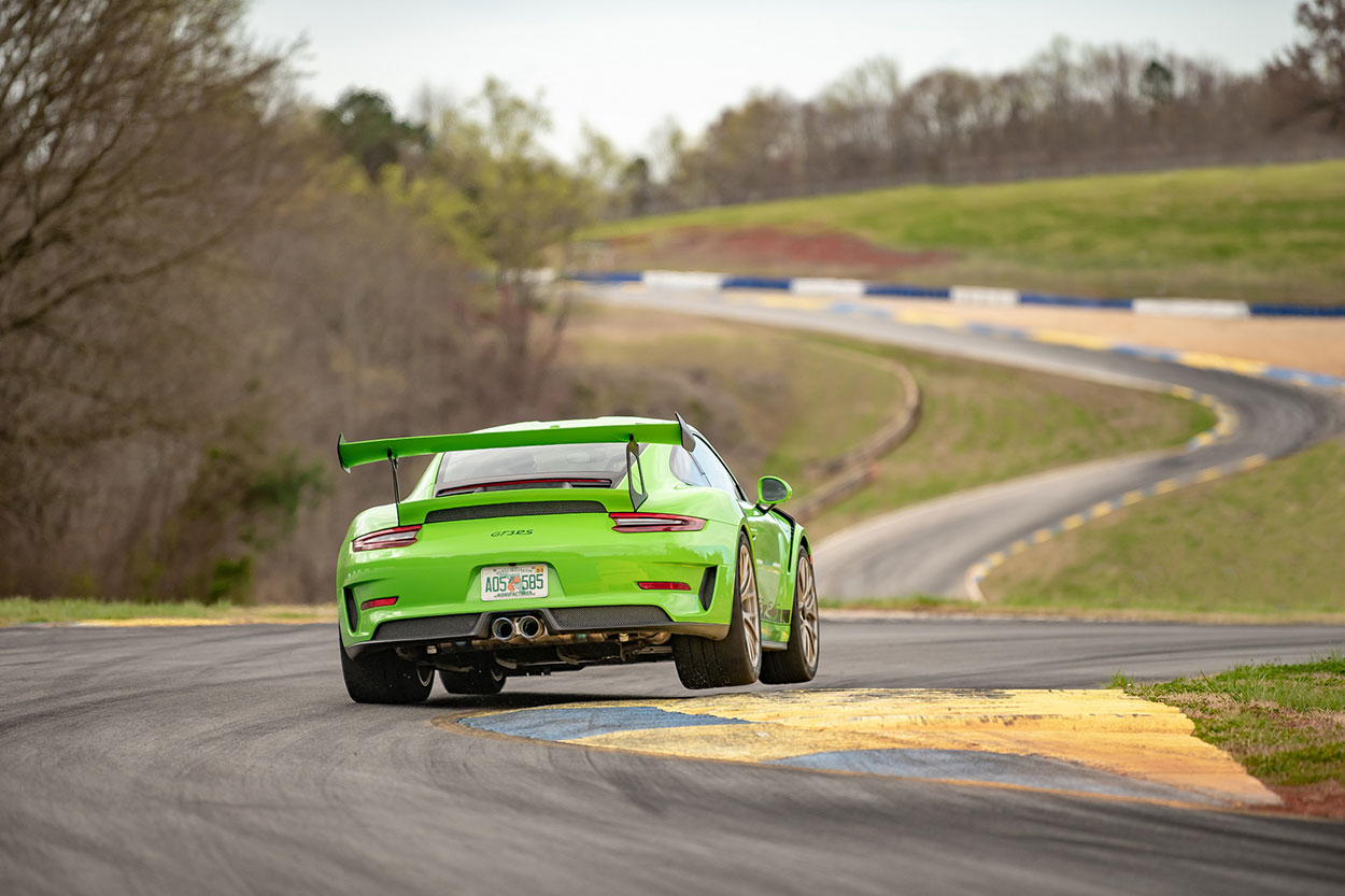 Porsche GT3 Three wheeling around Road Atlanta r/carporn