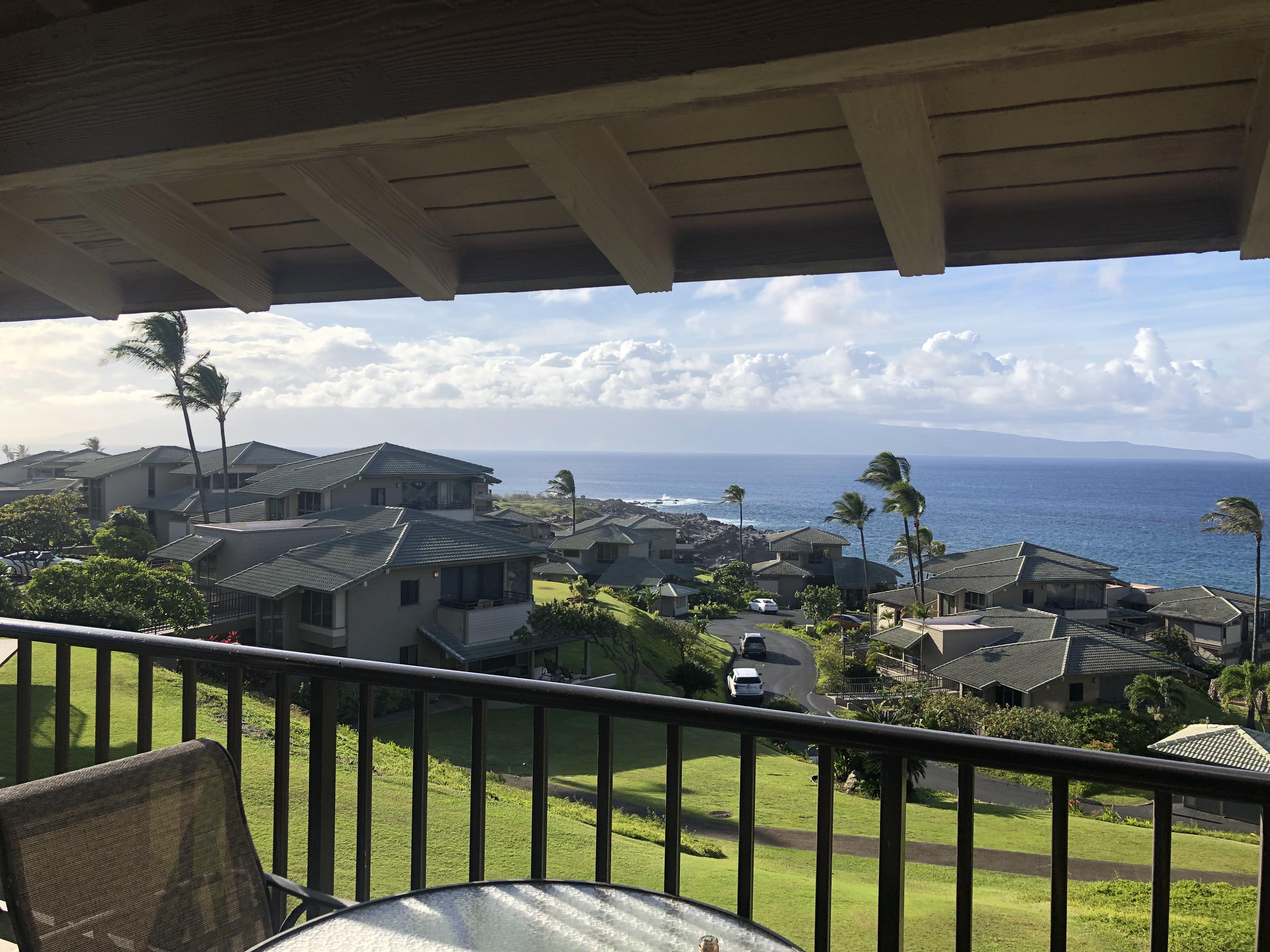 Our Maui condo balcony view with the entire island of Molokai. r/CozyPlaces