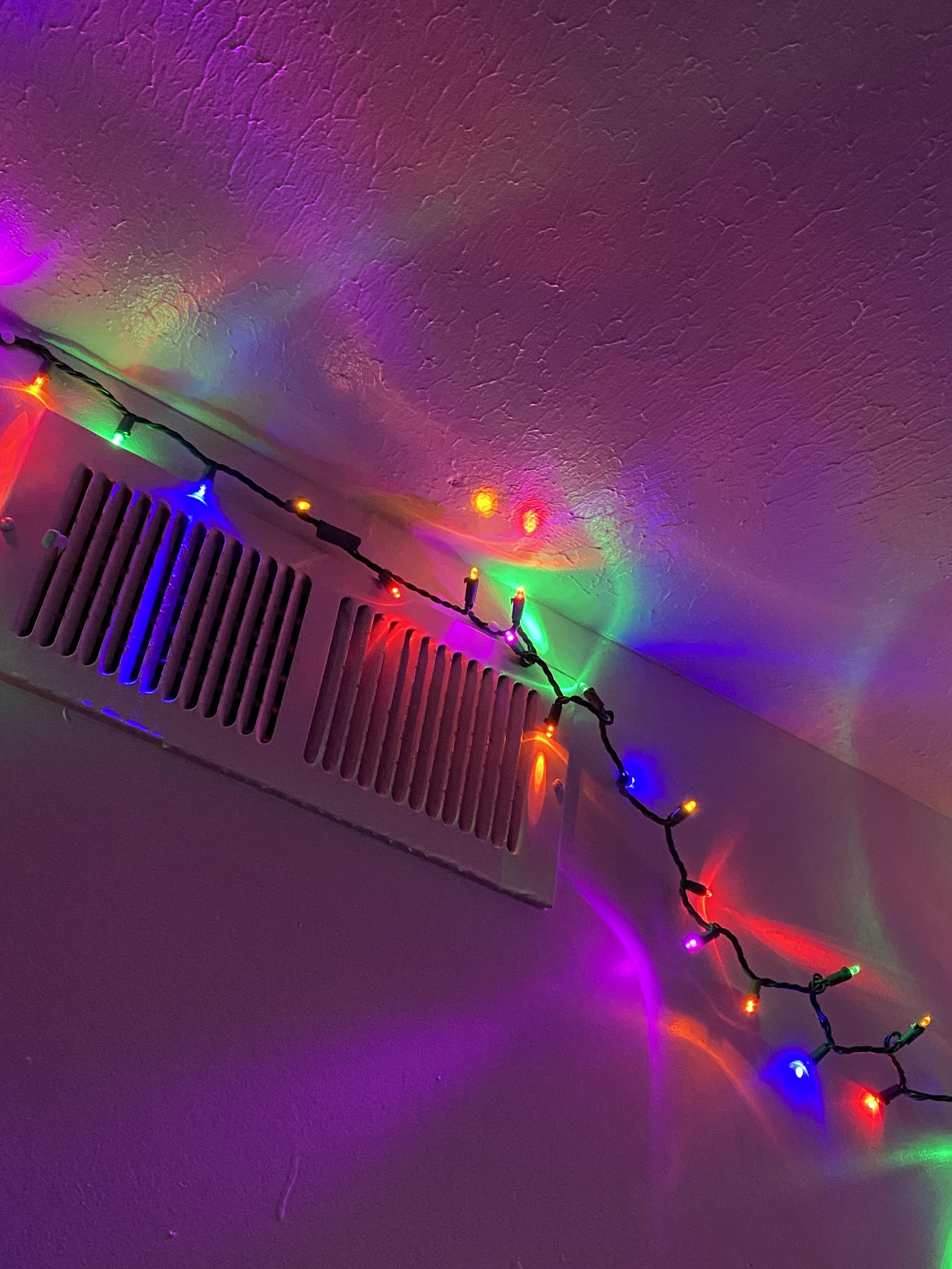 My Christmas lights look like their smiling down at you r/mildlyinteresting