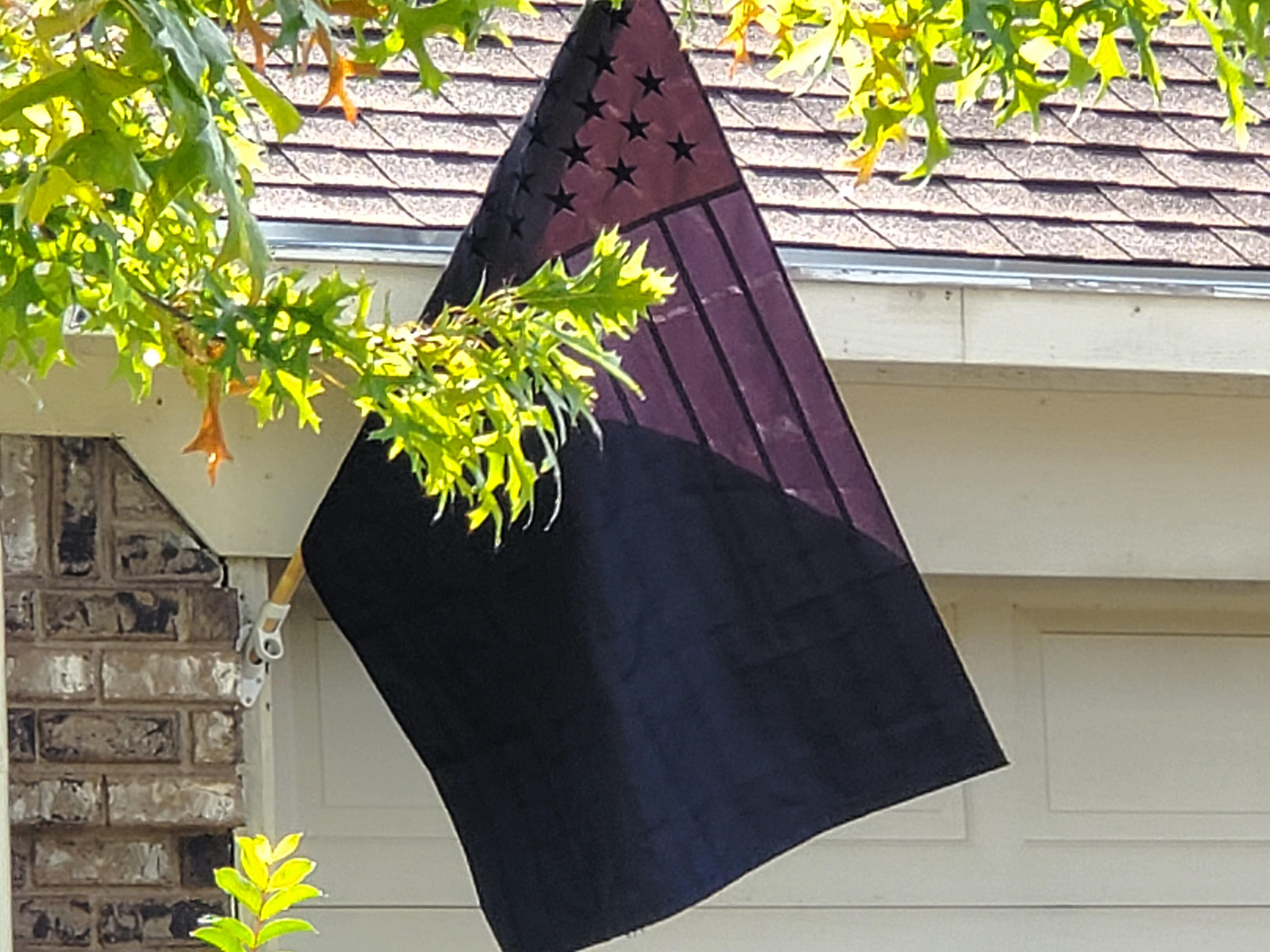 What is the significance of this flag? American flag but all black. r
