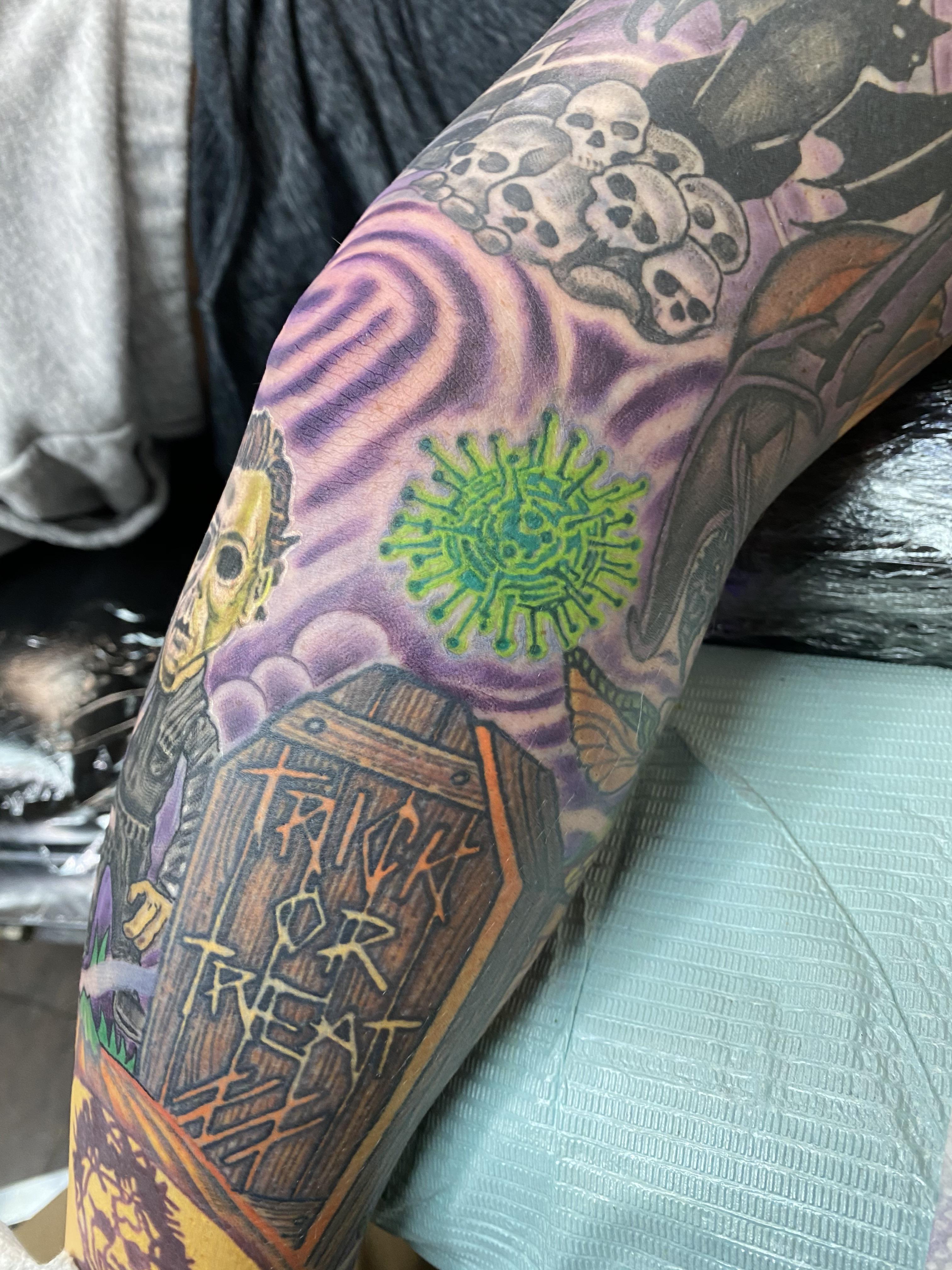 Covid Germ as part of my spooky sleeve; done by TJ Delany
